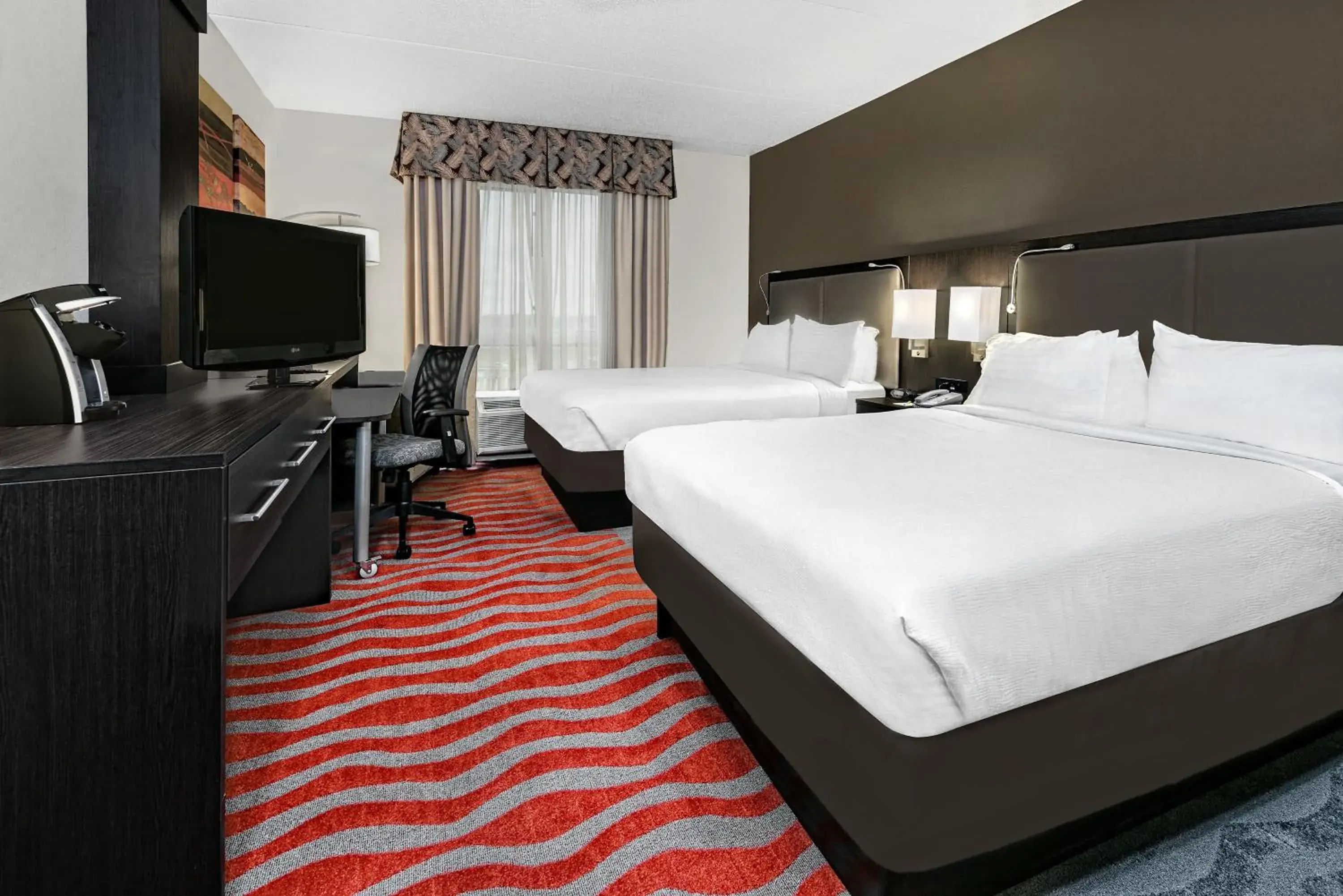 Photo of the whole room, Bed in Holiday Inn & Suites College Station-Aggieland by IHG Photo of the whole room, Bed in Holiday Inn & Suites College Station-Aggieland by IHG