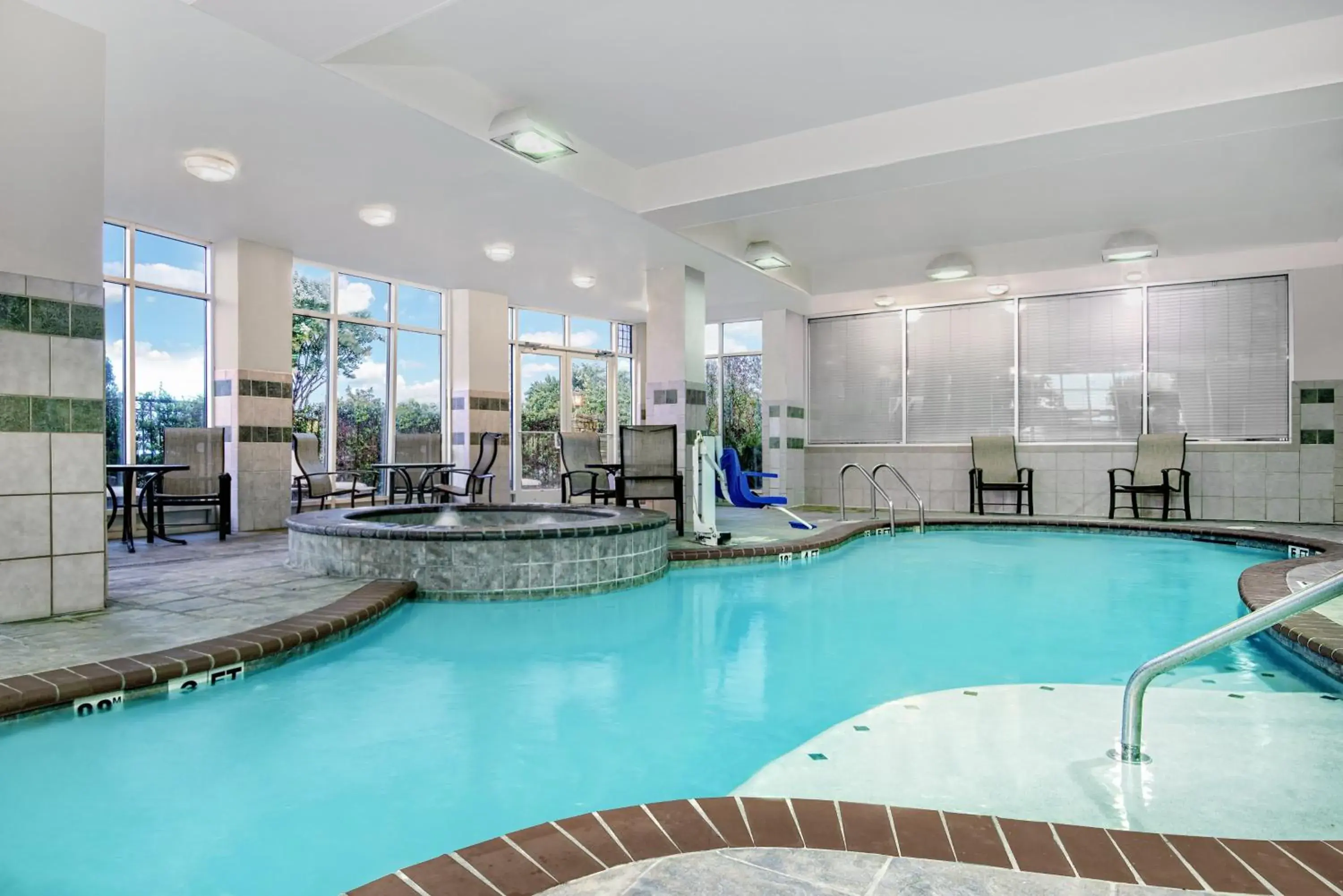 Swimming pool in Holiday Inn & Suites College Station-Aggieland by IHG Swimming pool in Holiday Inn & Suites College Station-Aggieland by IHG