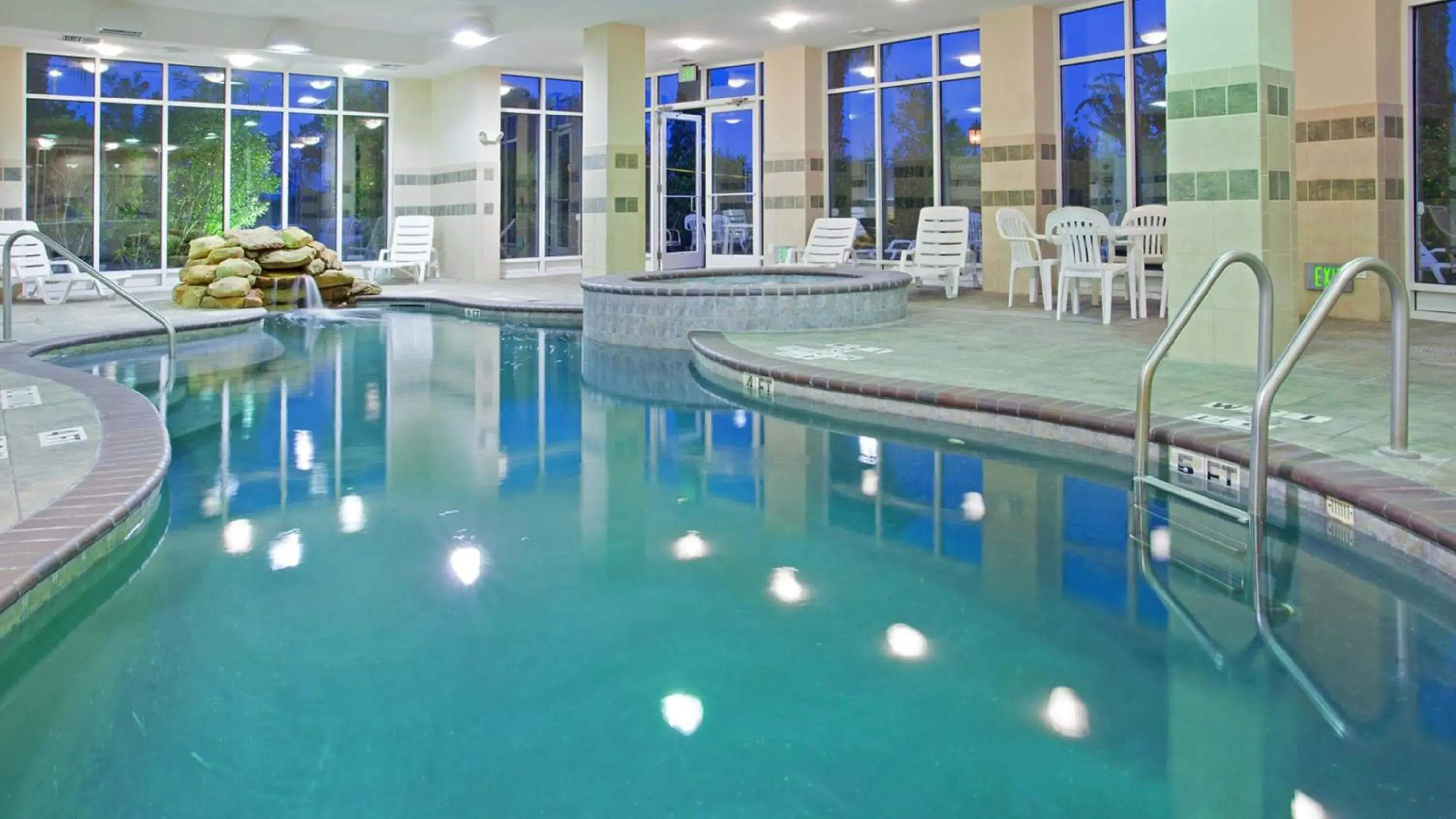 Swimming pool in Holiday Inn & Suites College Station-Aggieland by IHG Swimming pool in Holiday Inn & Suites College Station-Aggieland by IHG