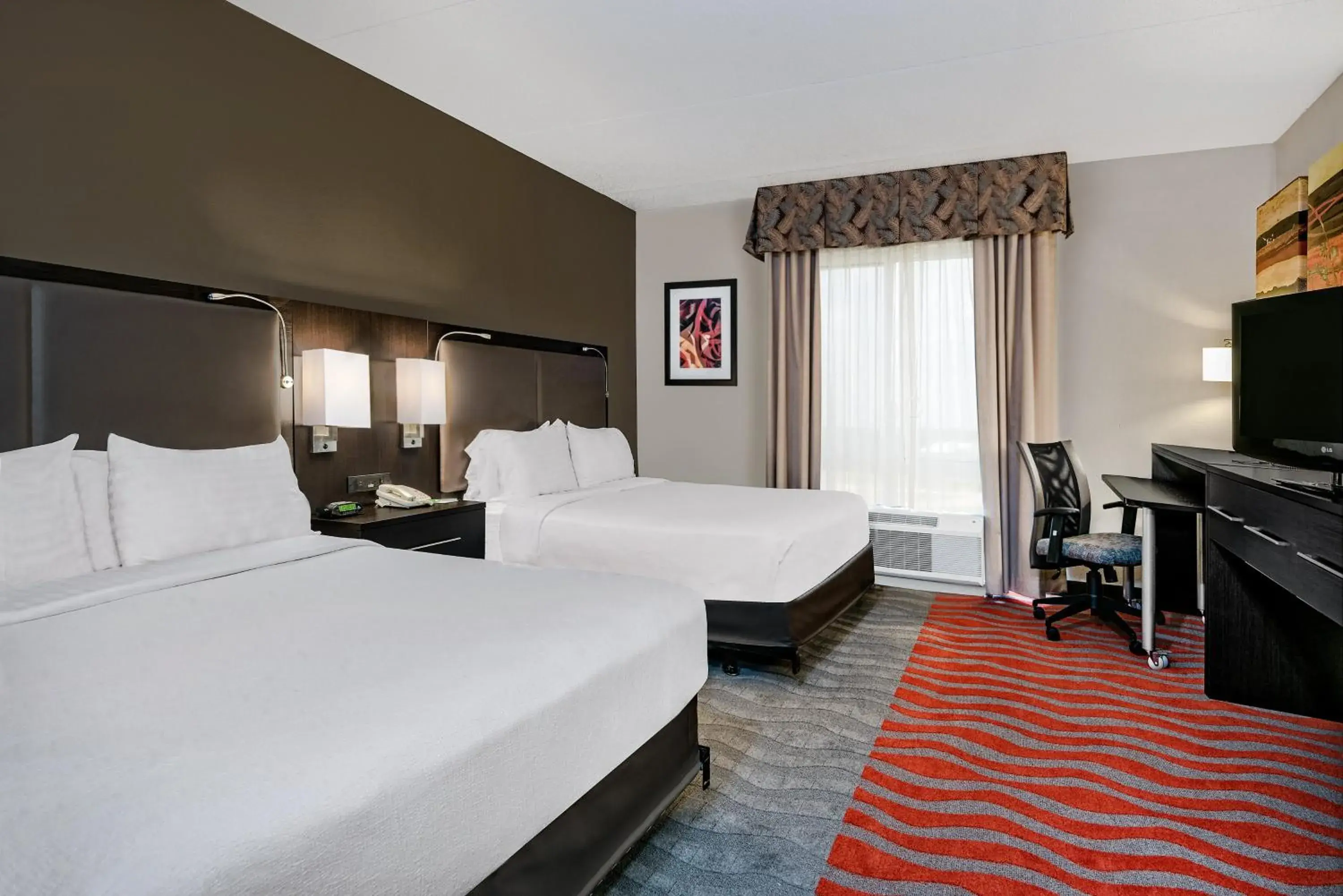 Photo of the whole room, Bed in Holiday Inn & Suites College Station-Aggieland by IHG Photo of the whole room, Bed in Holiday Inn & Suites College Station-Aggieland by IHG