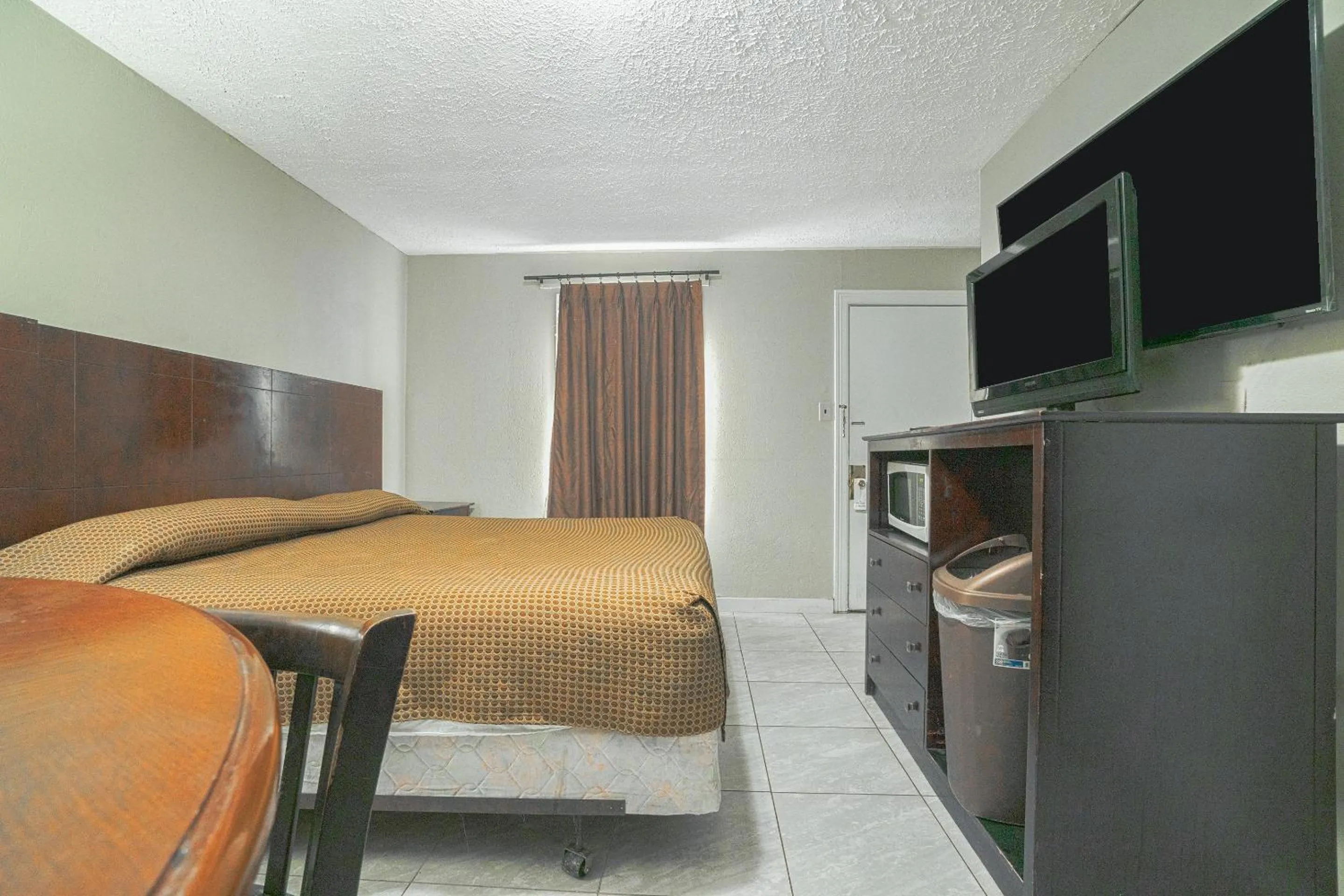 Bedroom, Bed in Texana Inn Edna By OYO