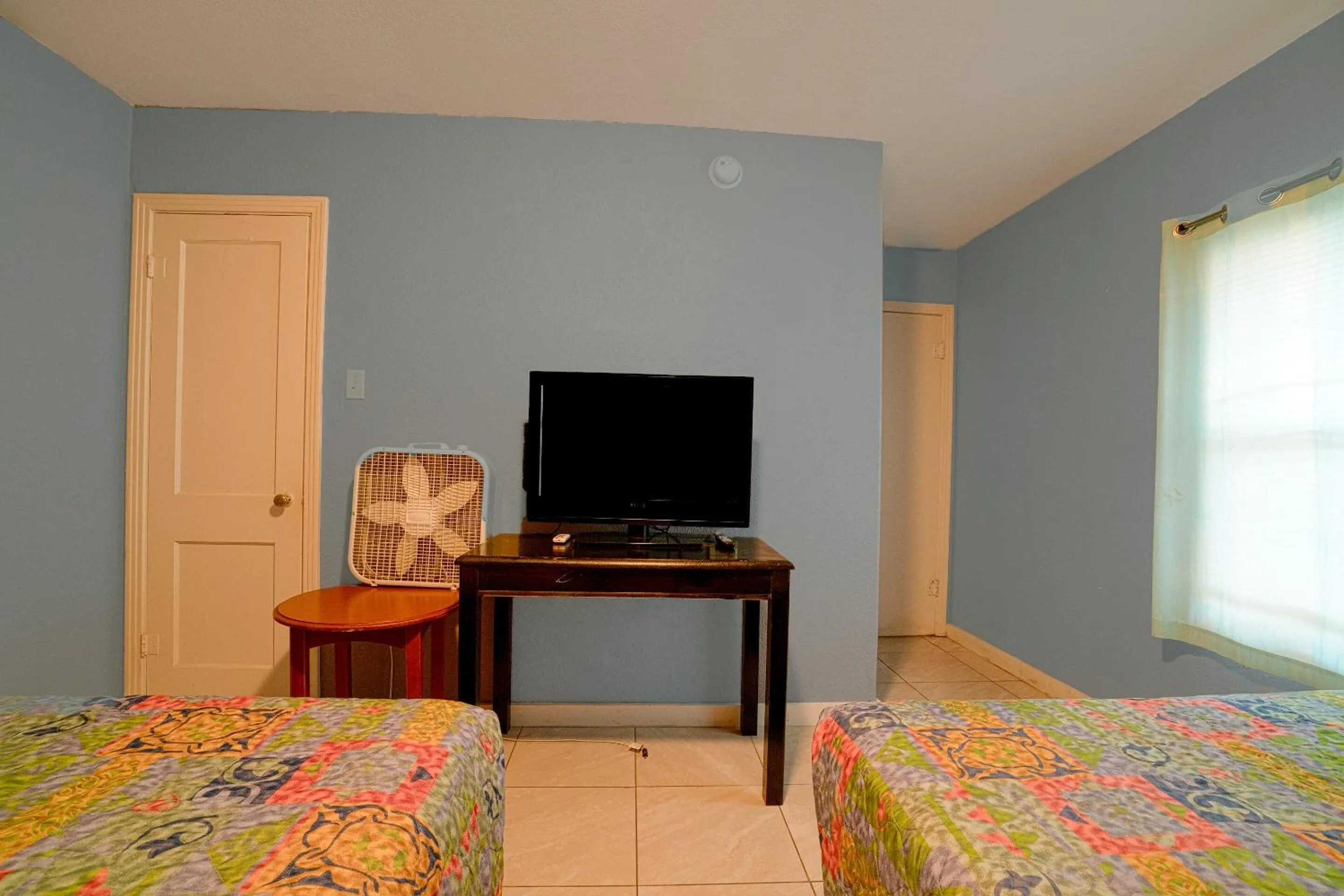Bedroom, Bed in Texana Inn Edna By OYO