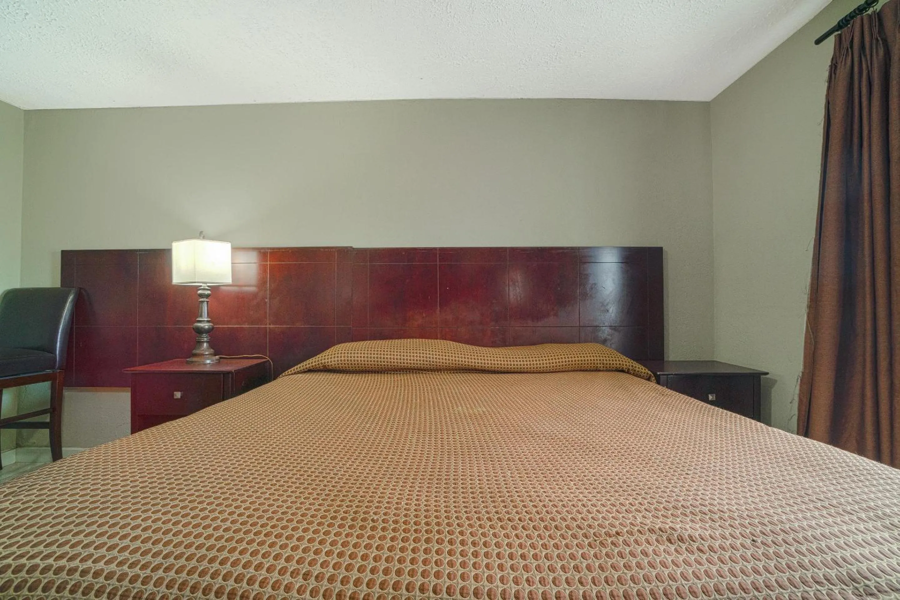 Bedroom, Bed in Texana Inn Edna By OYO