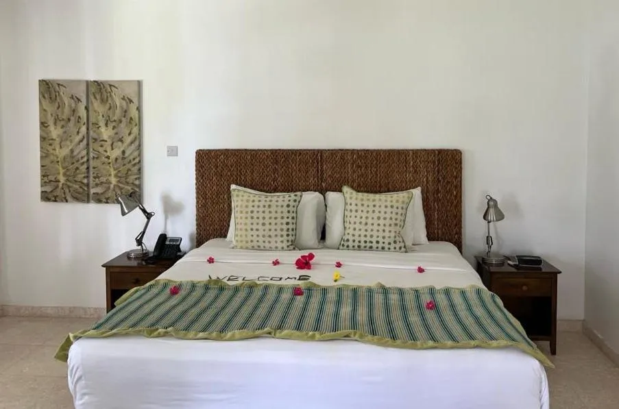 Bed in Bequia Plantation Hotel