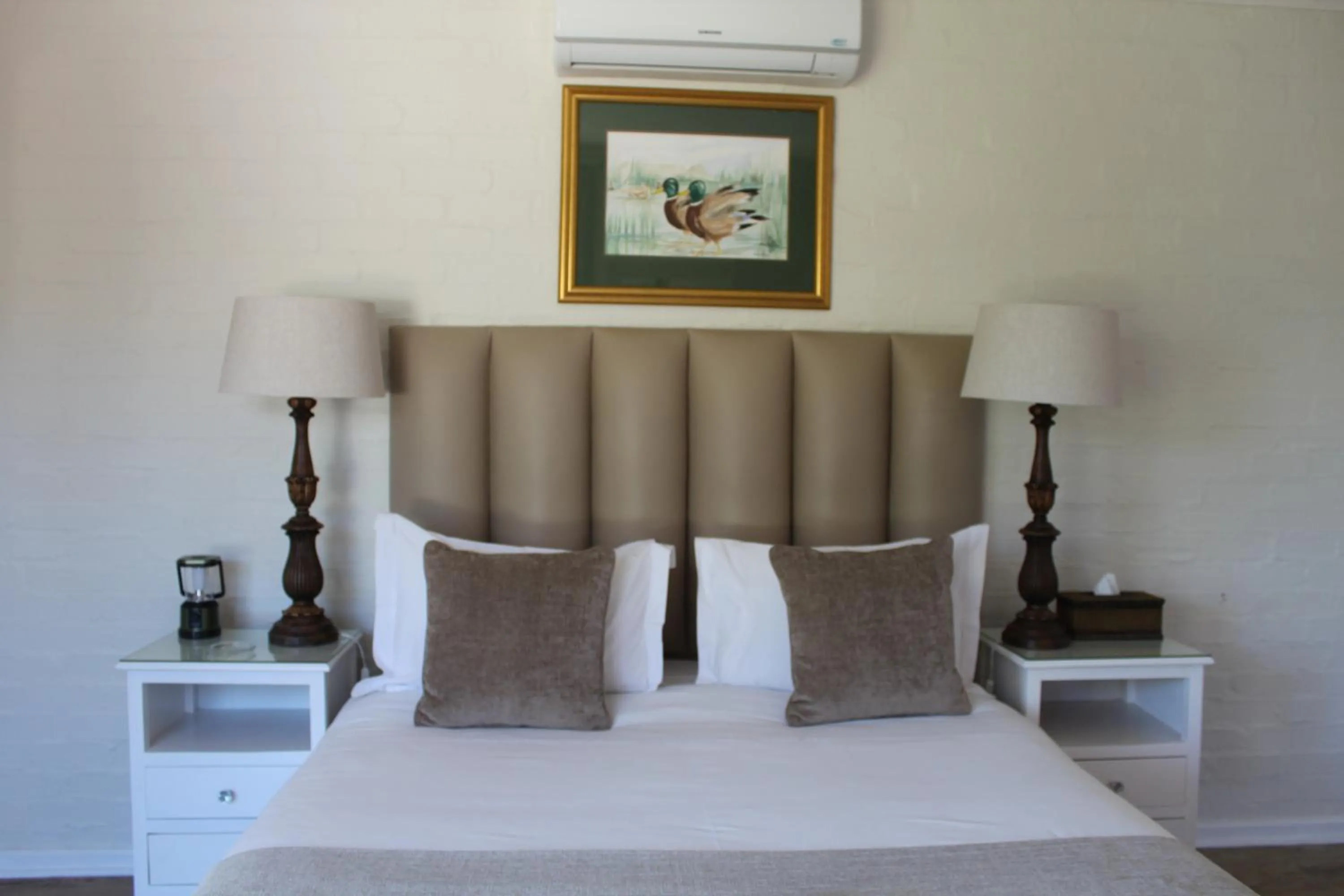 Bed in Cinnamon House Bed & Breakfast