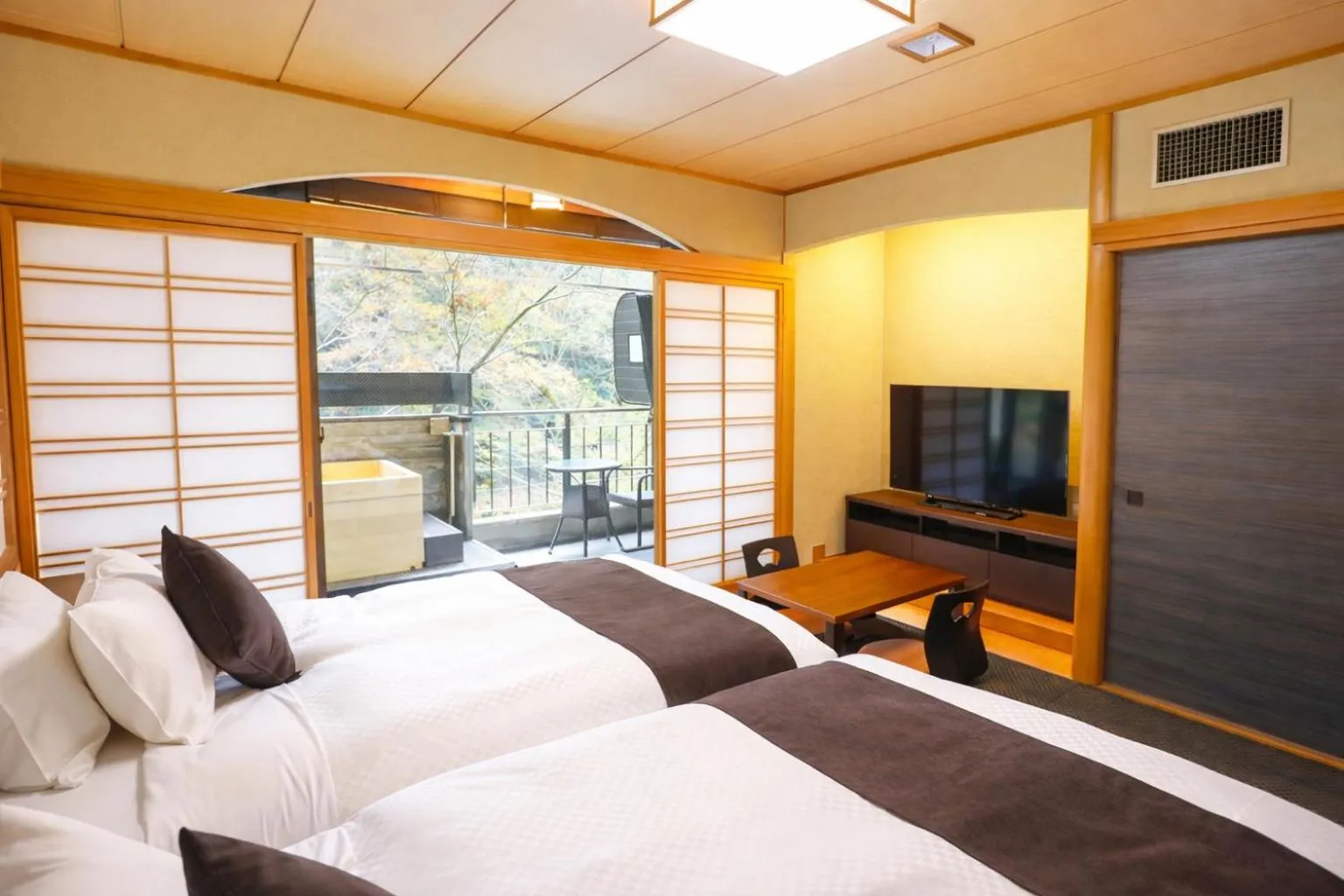 Photo of the whole room, Bed in LiVEMAX RESORT Okudogo