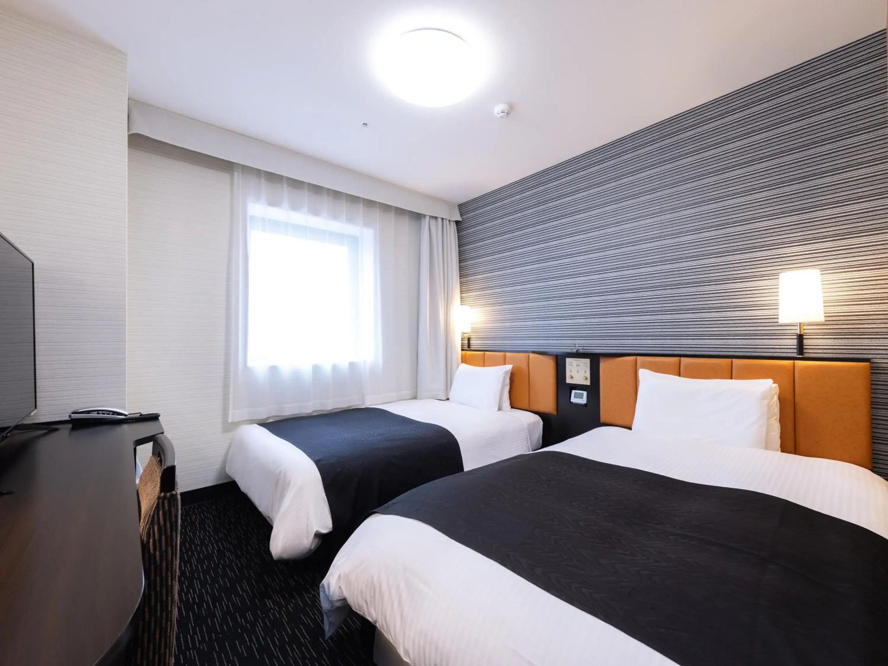 Bed in APA Hotel Yamagata Tsuruoka Ekimae Bed in APA Hotel Yamagata Tsuruoka Ekimae