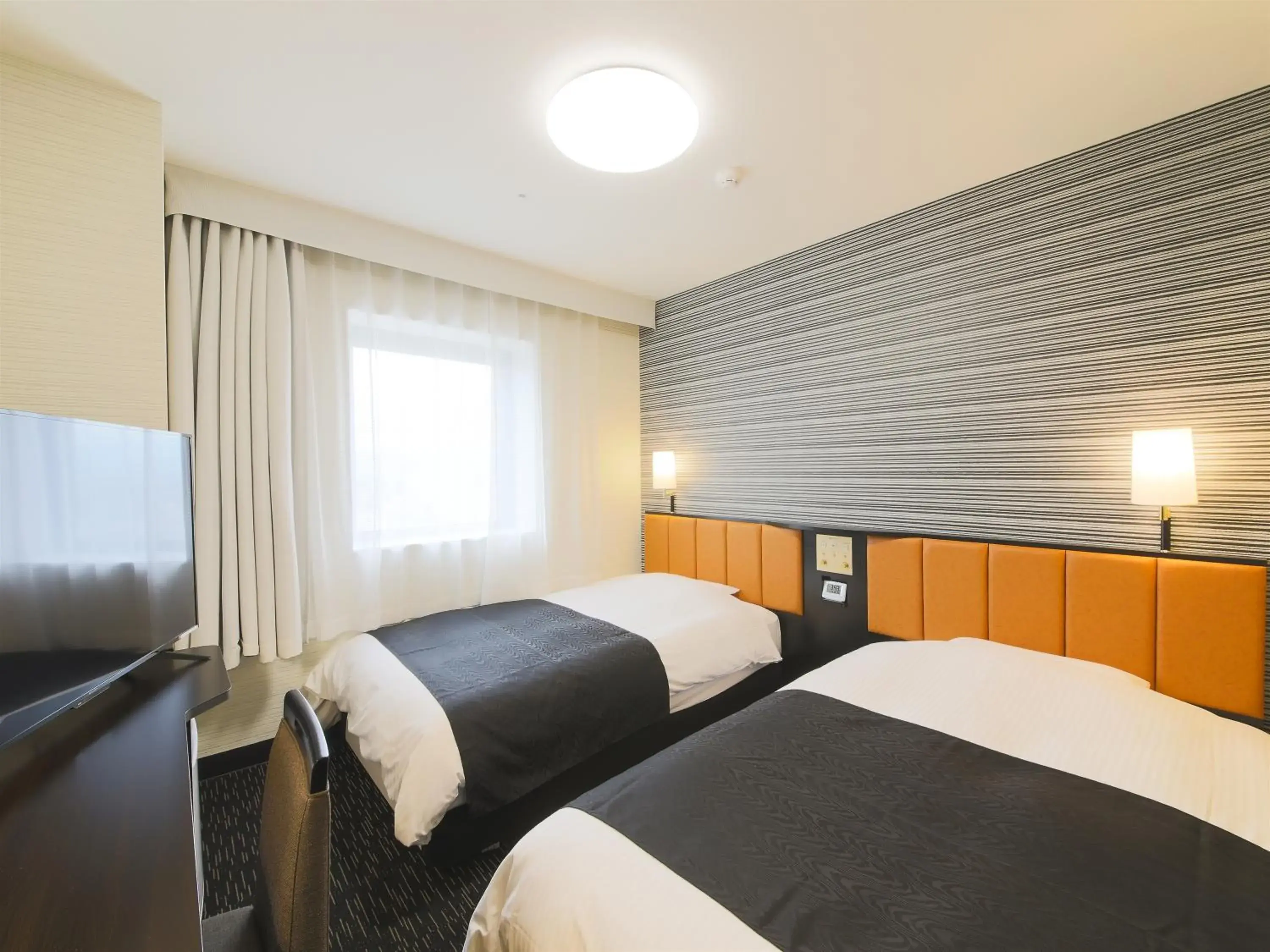 Photo of the whole room, Bed in APA Hotel Yamagata Tsuruoka Ekimae Photo of the whole room, Bed in APA Hotel Yamagata Tsuruoka Ekimae