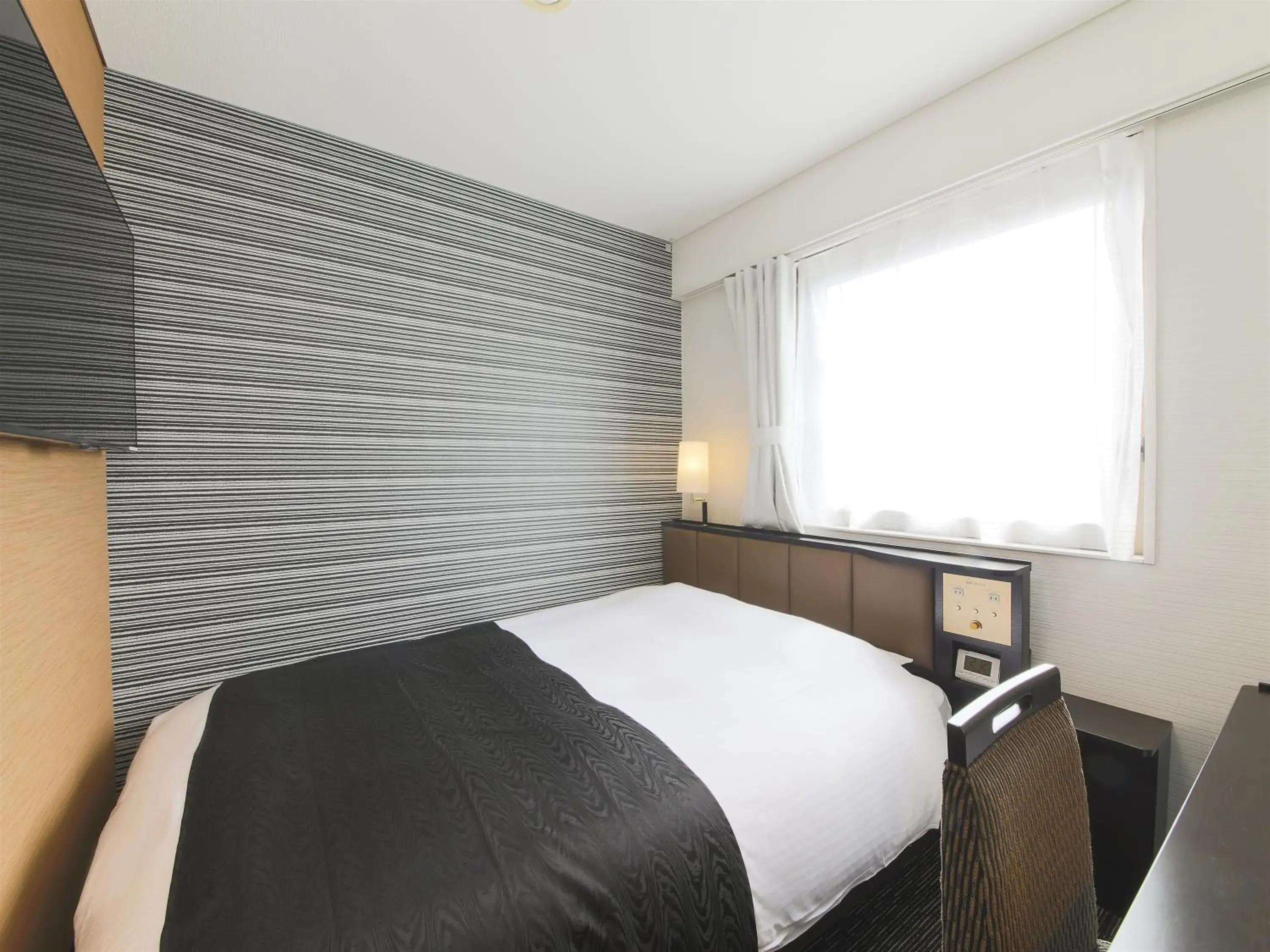 Photo of the whole room, Bed in APA Hotel Yamagata Tsuruoka Ekimae Photo of the whole room, Bed in APA Hotel Yamagata Tsuruoka Ekimae