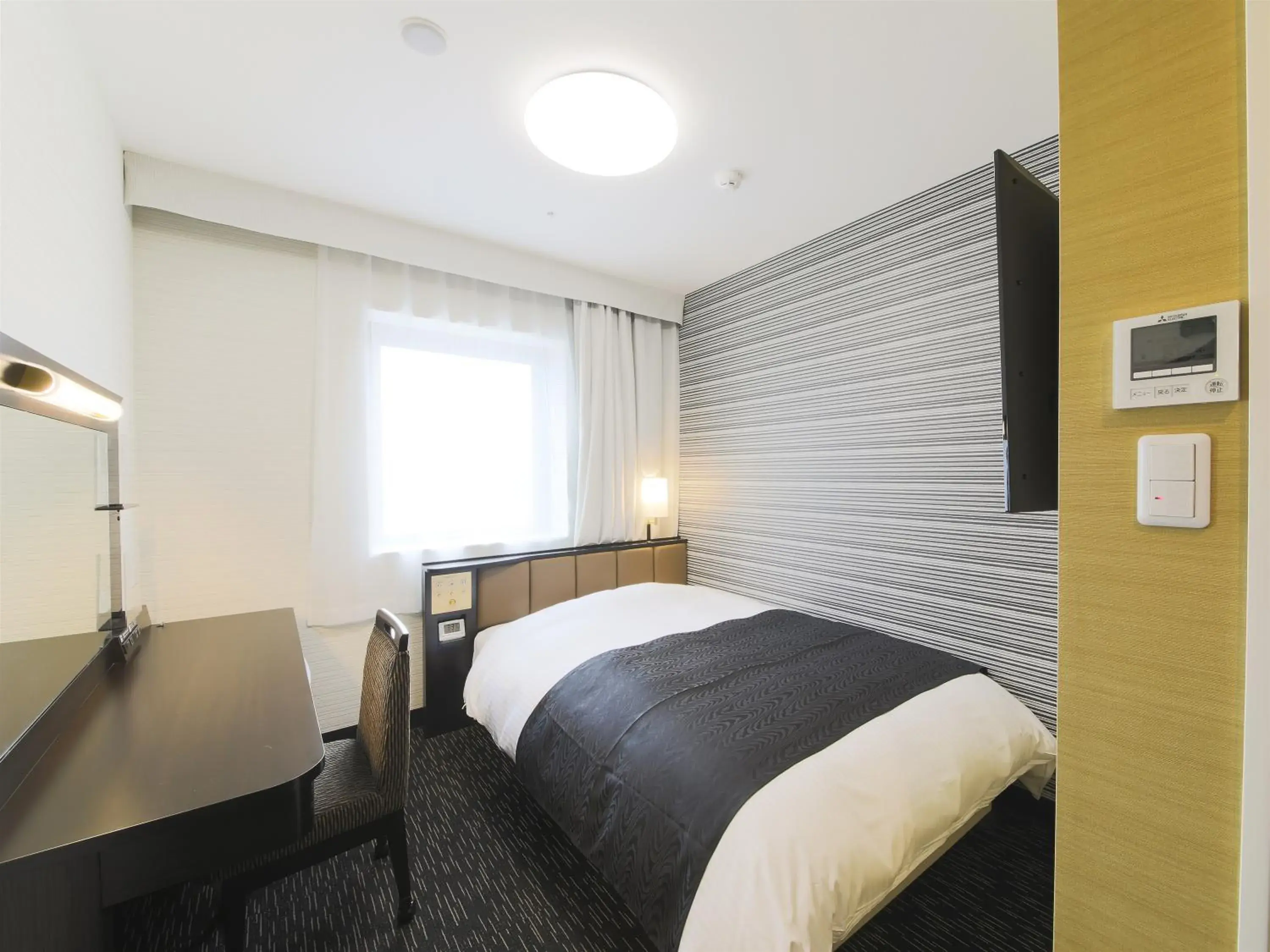 Photo of the whole room, Bed in APA Hotel Yamagata Tsuruoka Ekimae Photo of the whole room, Bed in APA Hotel Yamagata Tsuruoka Ekimae