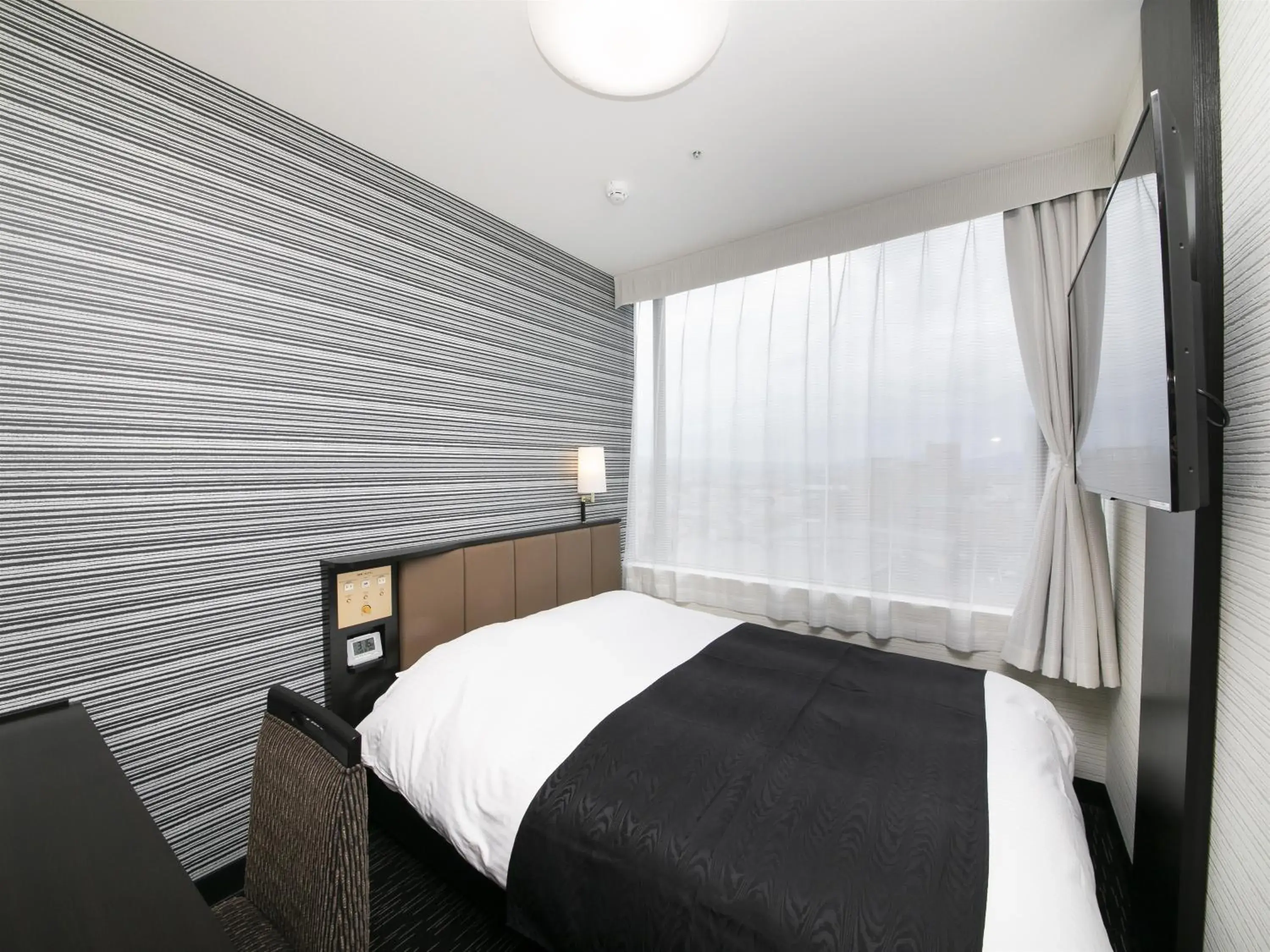 Photo of the whole room, Bed in APA Hotel Yamagata Tsuruoka Ekimae Photo of the whole room, Bed in APA Hotel Yamagata Tsuruoka Ekimae