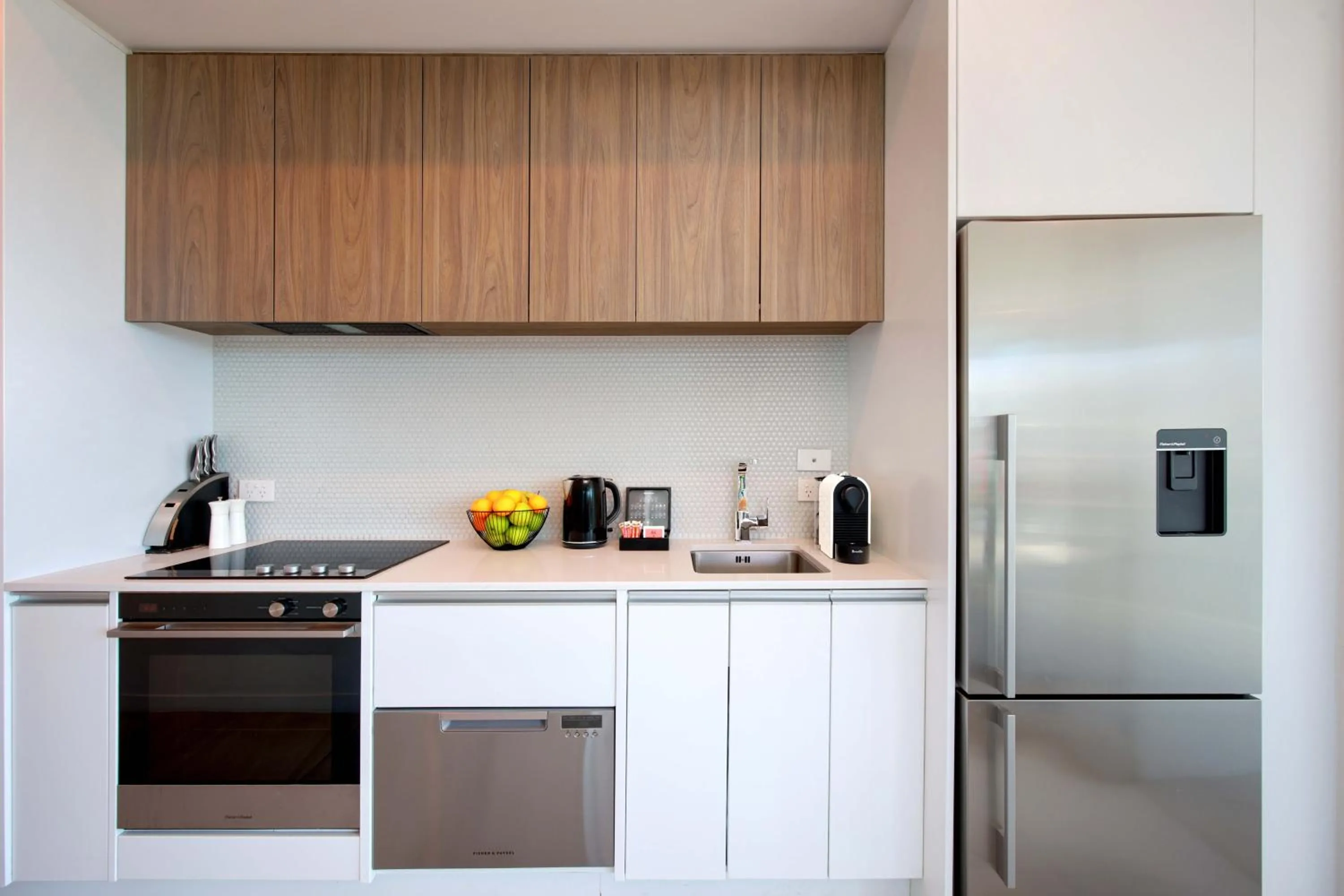 Kitchen or kitchenette in Swiss-Belsuites Victoria Park Auckland