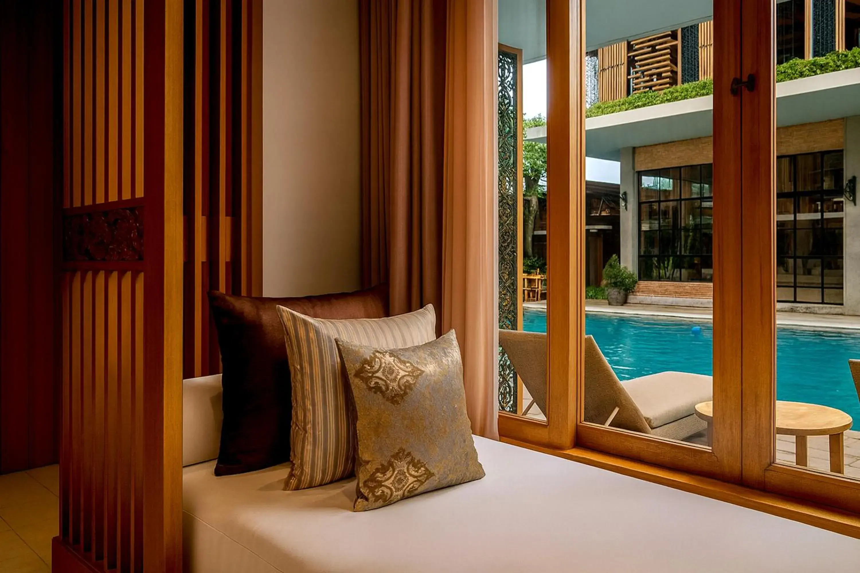 Pool view, Bed in Swarga Suites Bali Berawa, Marclan Collection Pool view, Bed in Swarga Suites Bali Berawa, Marclan Collection