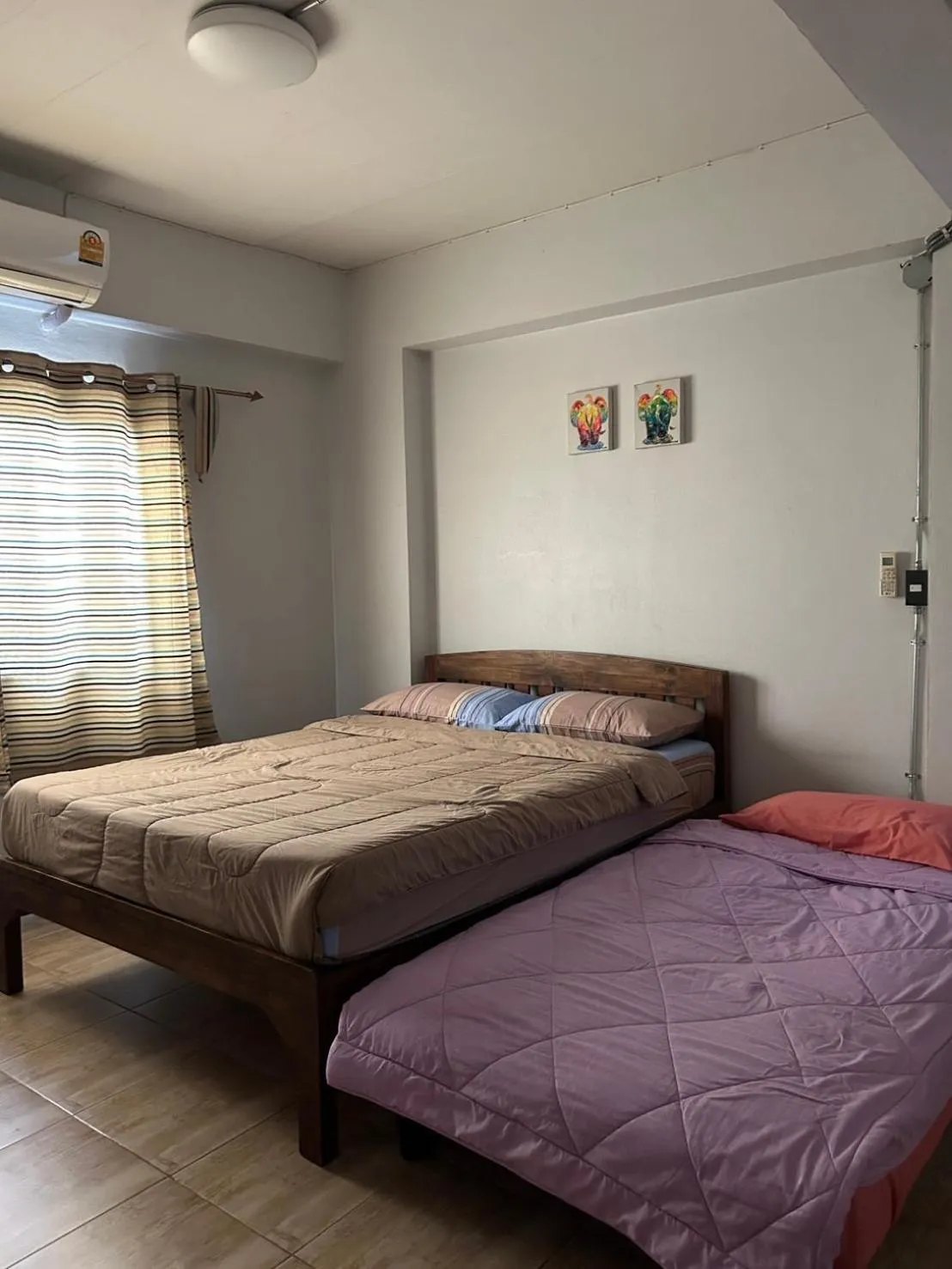 Bed in Chiangmai HomeTeL