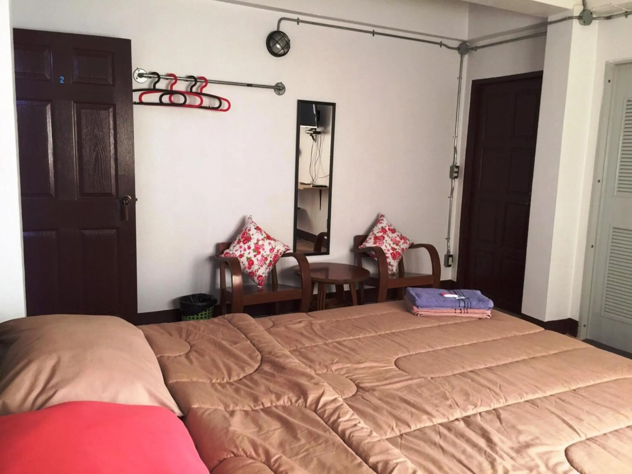 Bed in Chiangmai HomeTeL