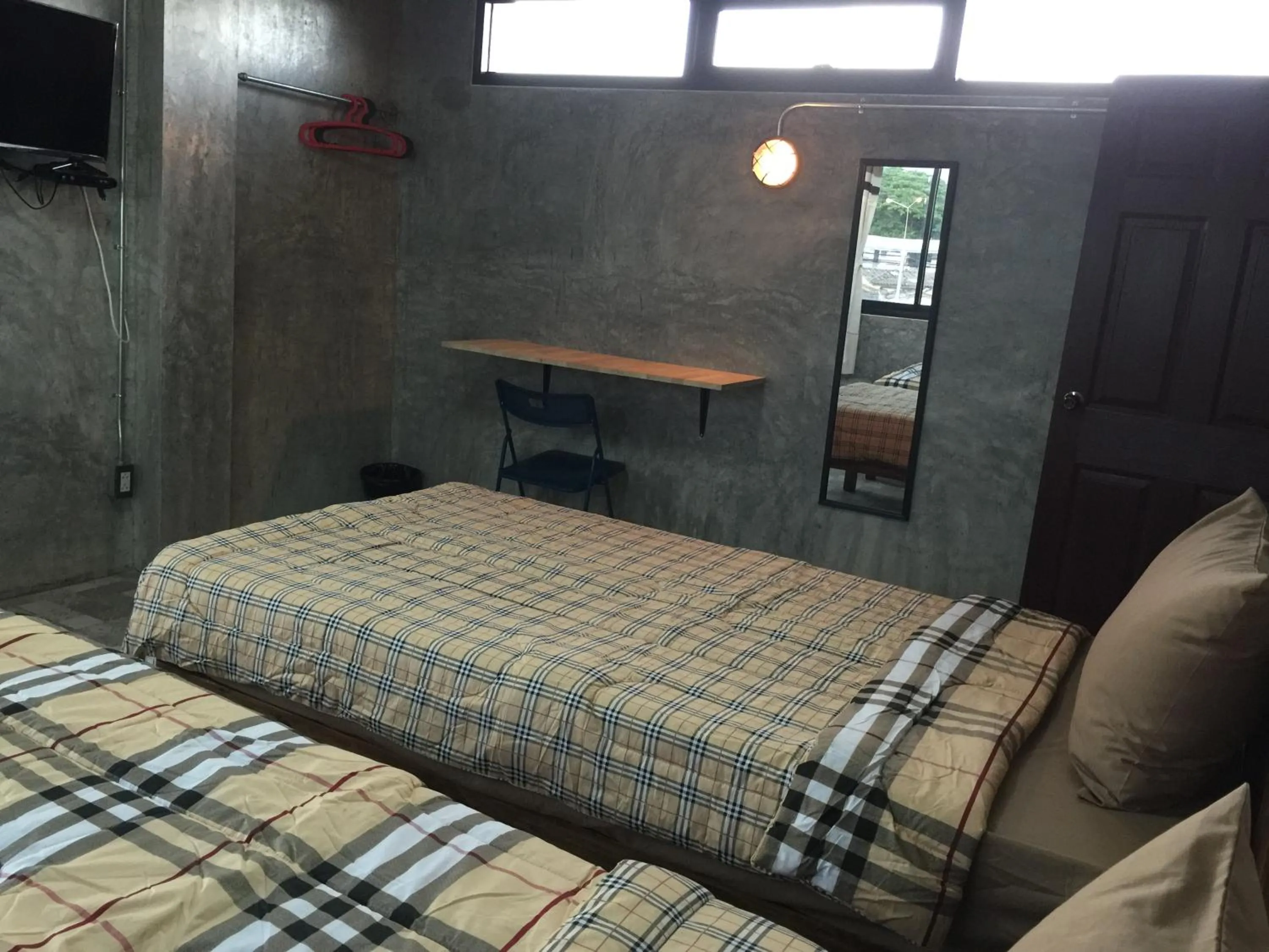 Bed in Chiangmai HomeTeL