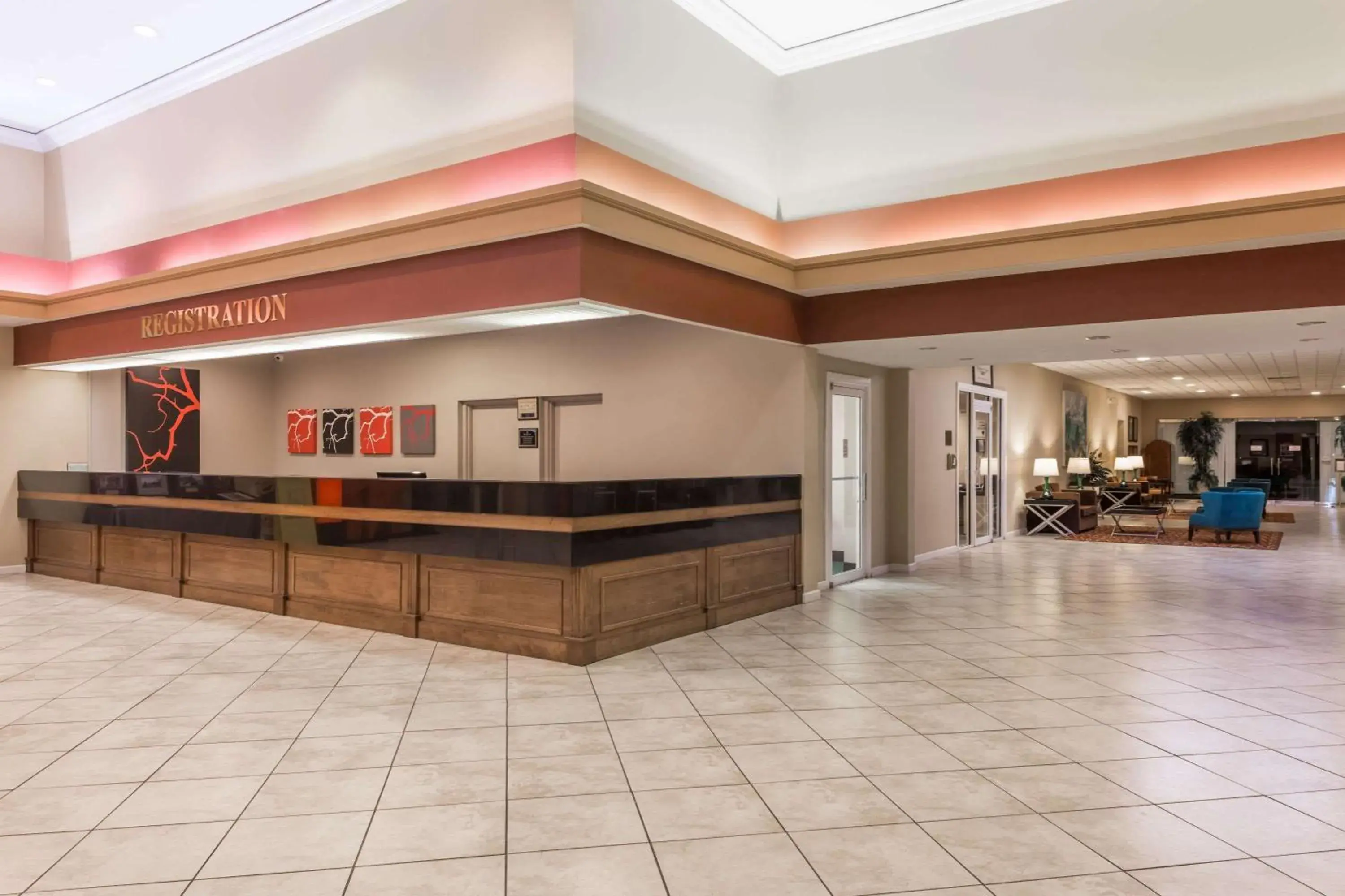 Lobby or reception in Ramada by Wyndham Kissimmee Gateway - Free Theme Park Shuttle Lobby or reception in Ramada by Wyndham Kissimmee Gateway - Free Theme Park Shuttle