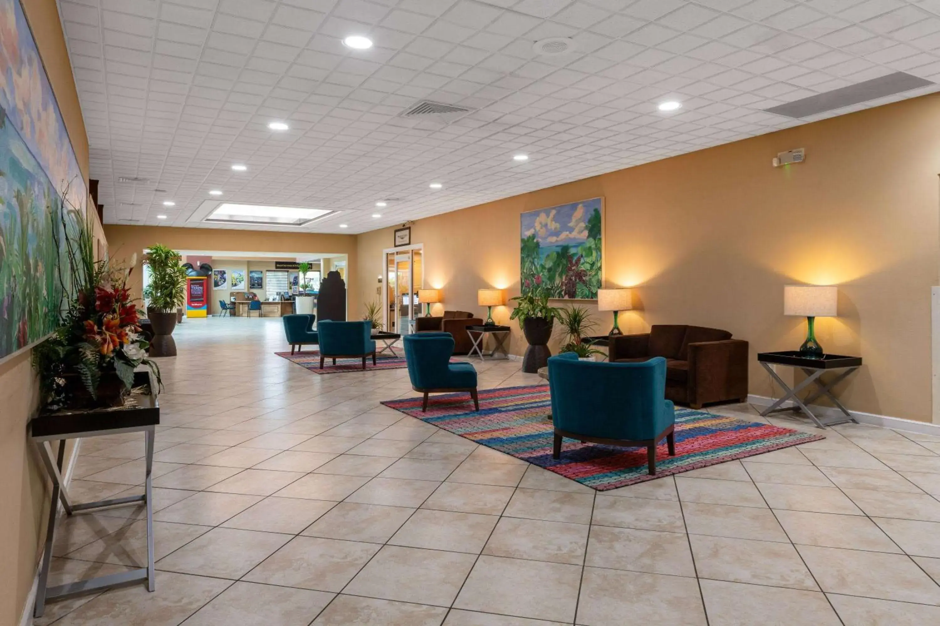 Lobby or reception in Ramada by Wyndham Kissimmee Gateway - Free Theme Park Shuttle Lobby or reception in Ramada by Wyndham Kissimmee Gateway - Free Theme Park Shuttle