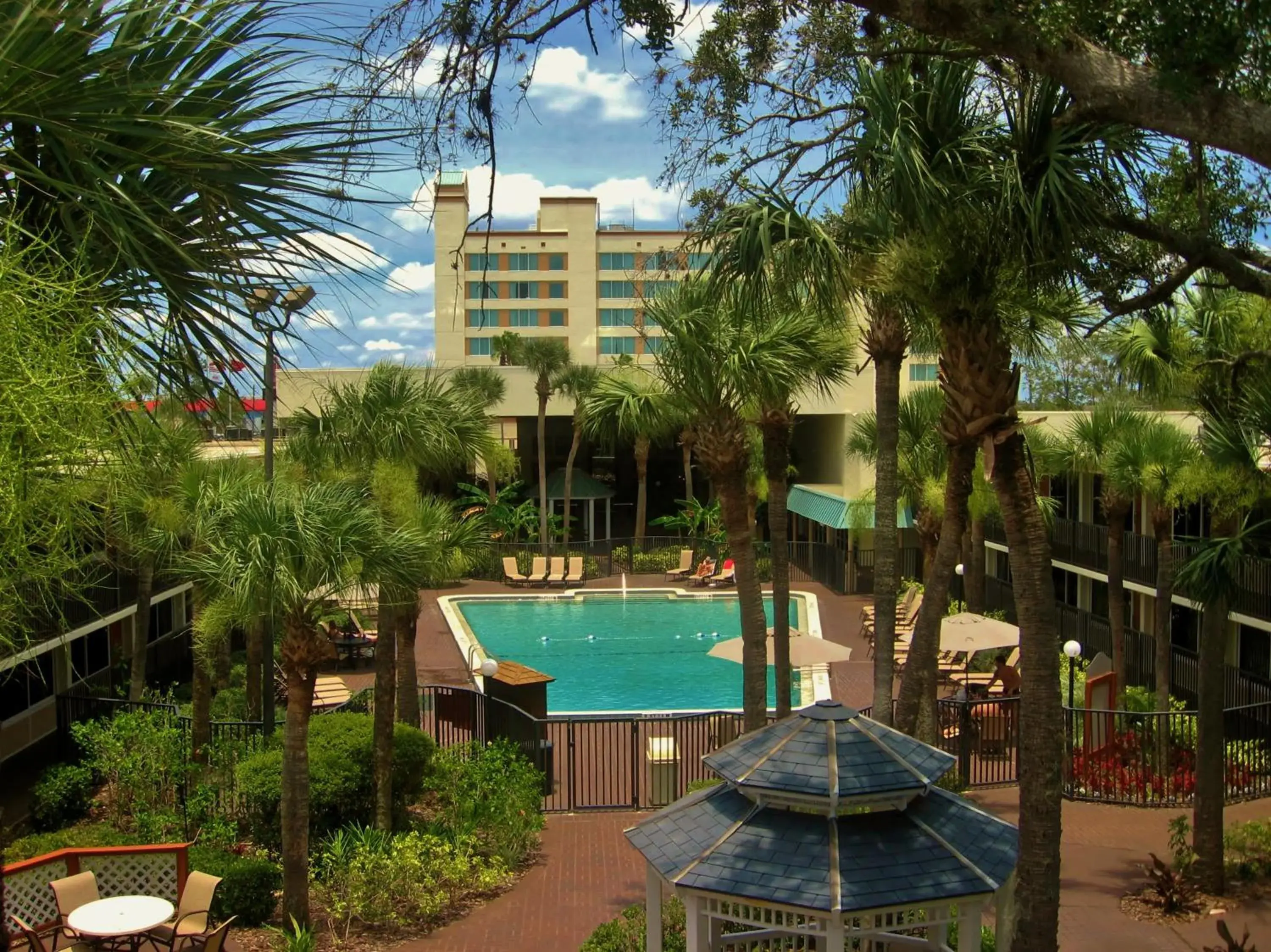 Property building in Ramada by Wyndham Kissimmee Gateway - Free Theme Park Shuttle Property building in Ramada by Wyndham Kissimmee Gateway - Free Theme Park Shuttle
