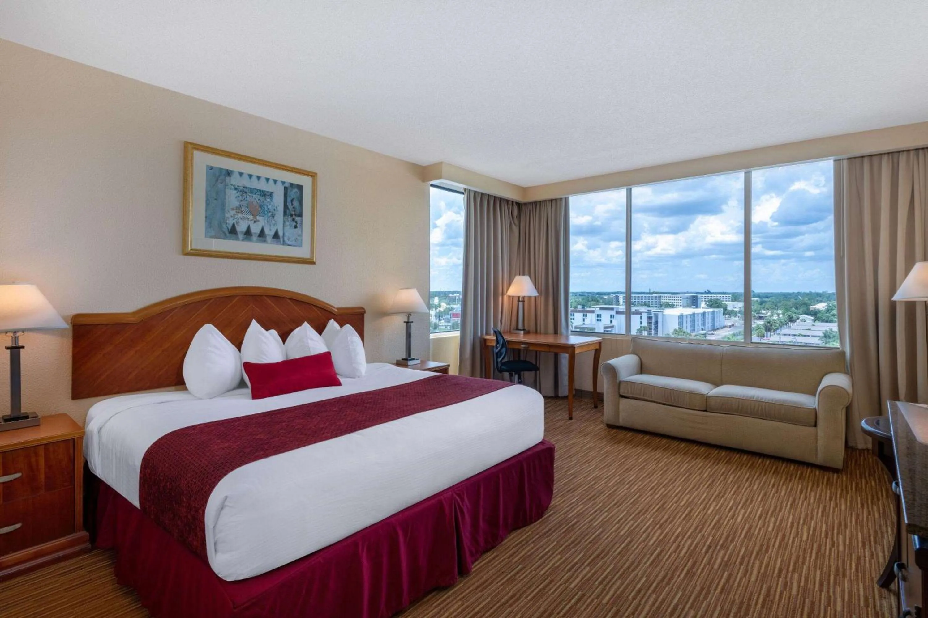Photo of the whole room, Bed in Ramada by Wyndham Kissimmee Gateway - Free Theme Park Shuttle