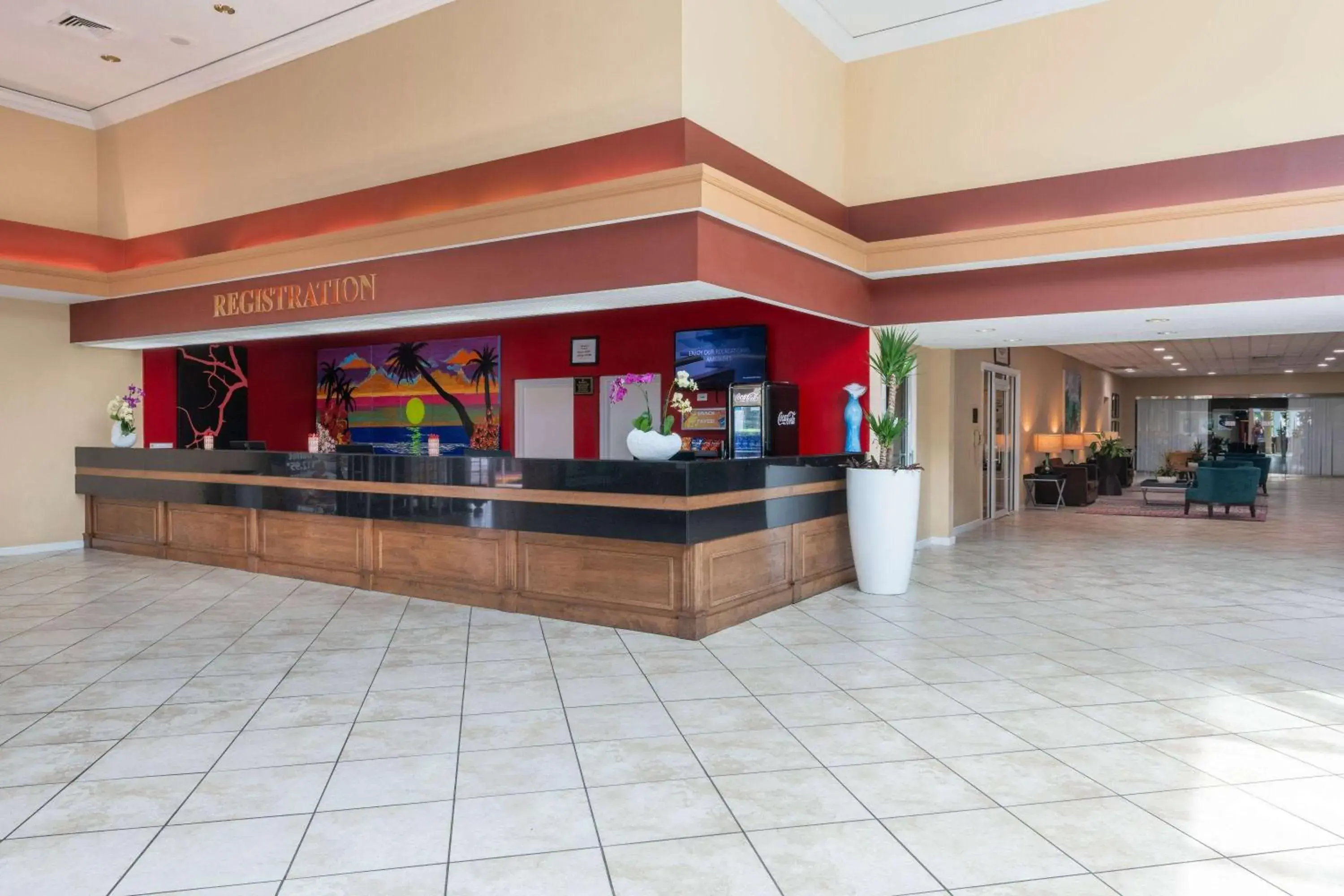 Lobby or reception in Ramada by Wyndham Kissimmee Gateway - Free Theme Park Shuttle Lobby or reception in Ramada by Wyndham Kissimmee Gateway - Free Theme Park Shuttle