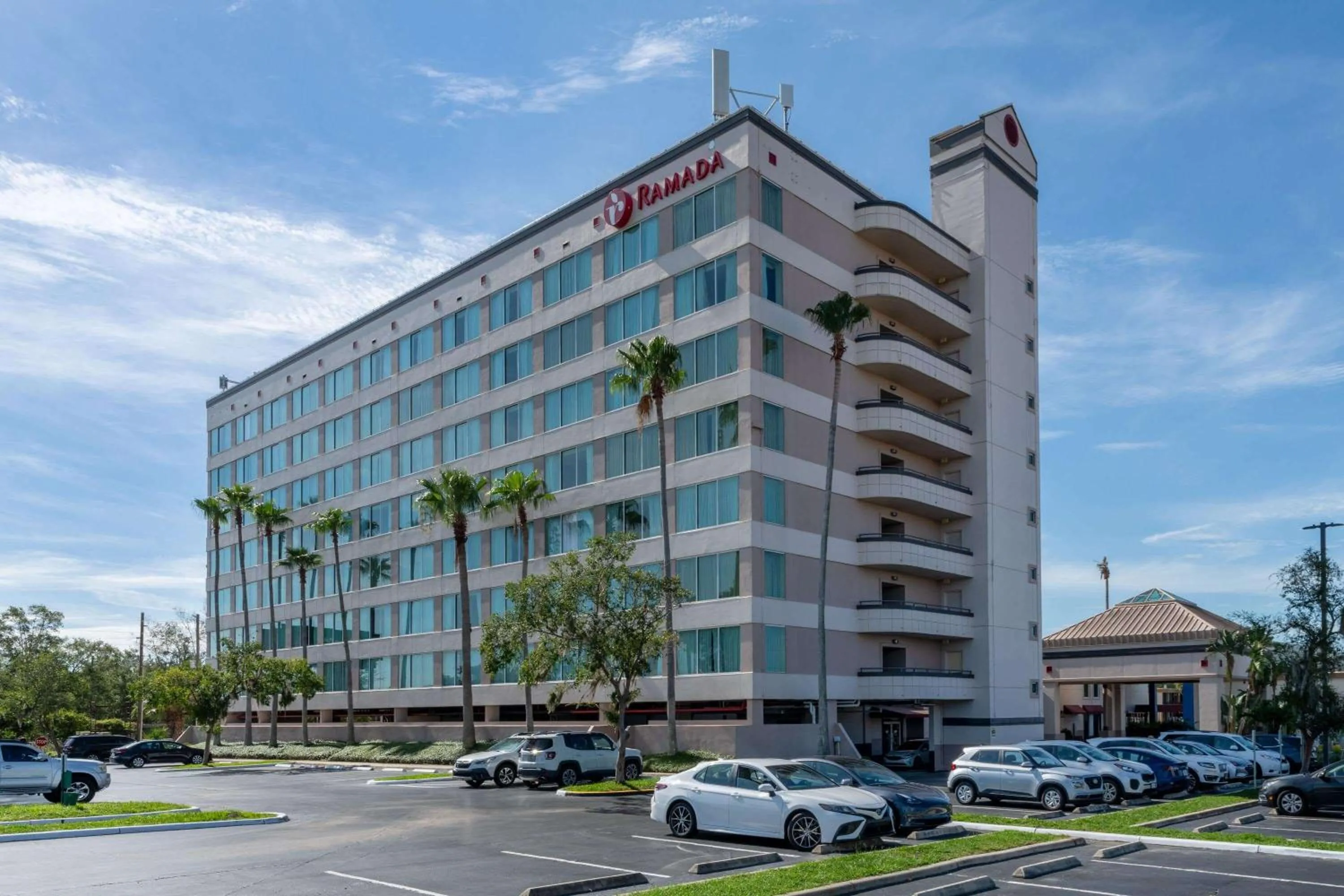 Property building in Ramada by Wyndham Kissimmee Gateway - Free Theme Park Shuttle
