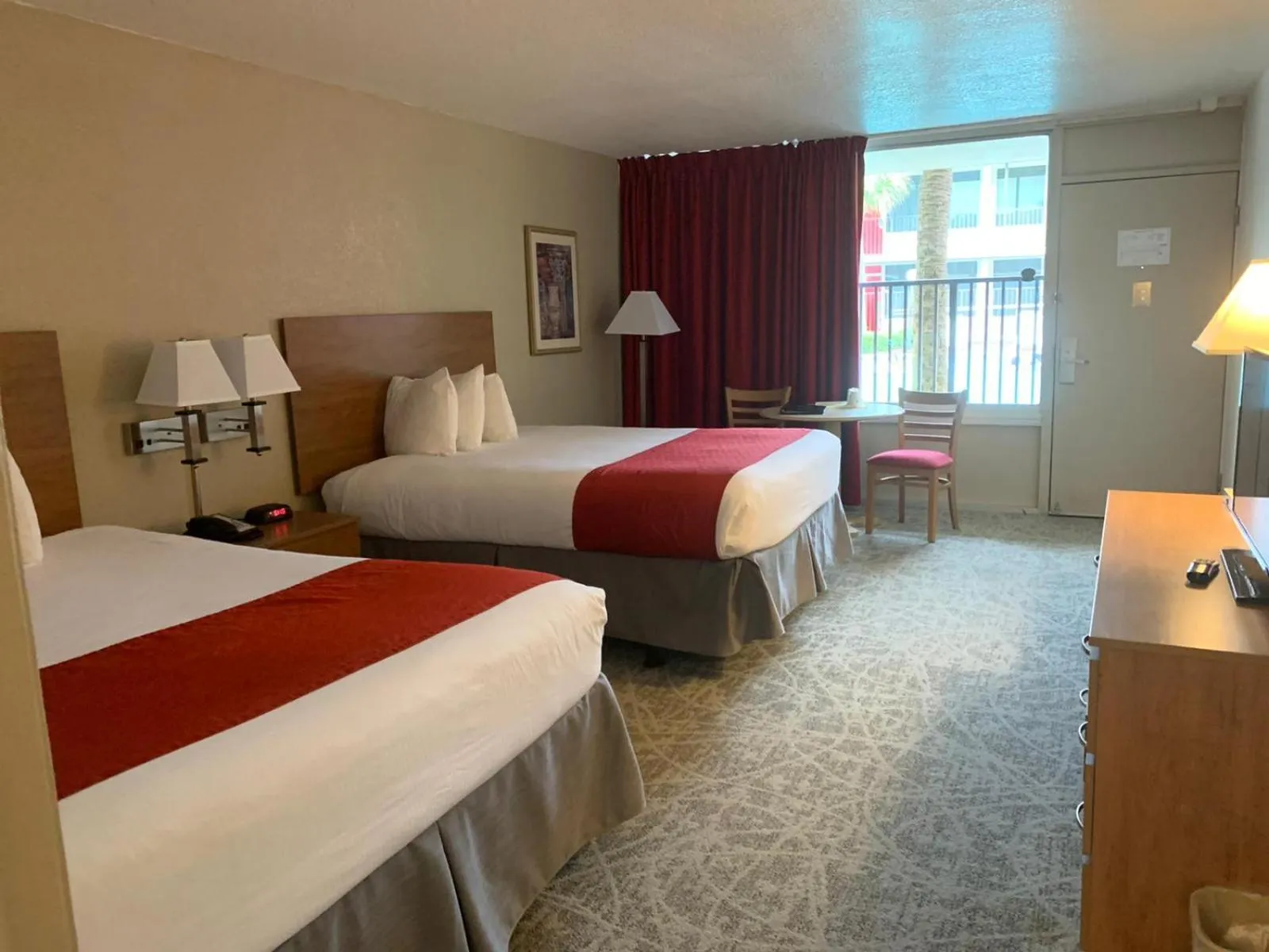 Bed in Ramada by Wyndham Kissimmee Gateway - Free Theme Park Shuttle