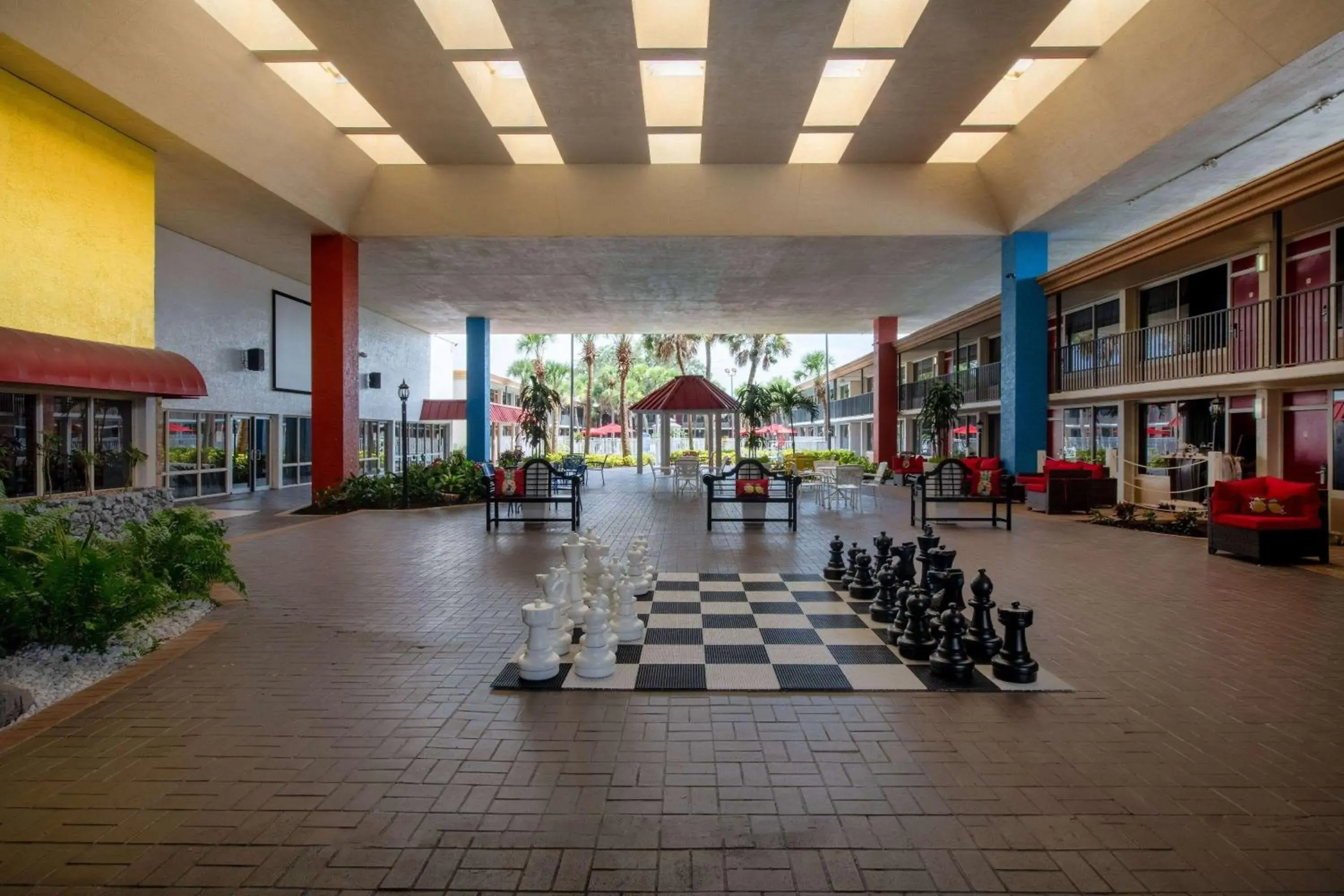 Inner courtyard view in Ramada by Wyndham Kissimmee Gateway - Free Theme Park Shuttle Inner courtyard view in Ramada by Wyndham Kissimmee Gateway - Free Theme Park Shuttle