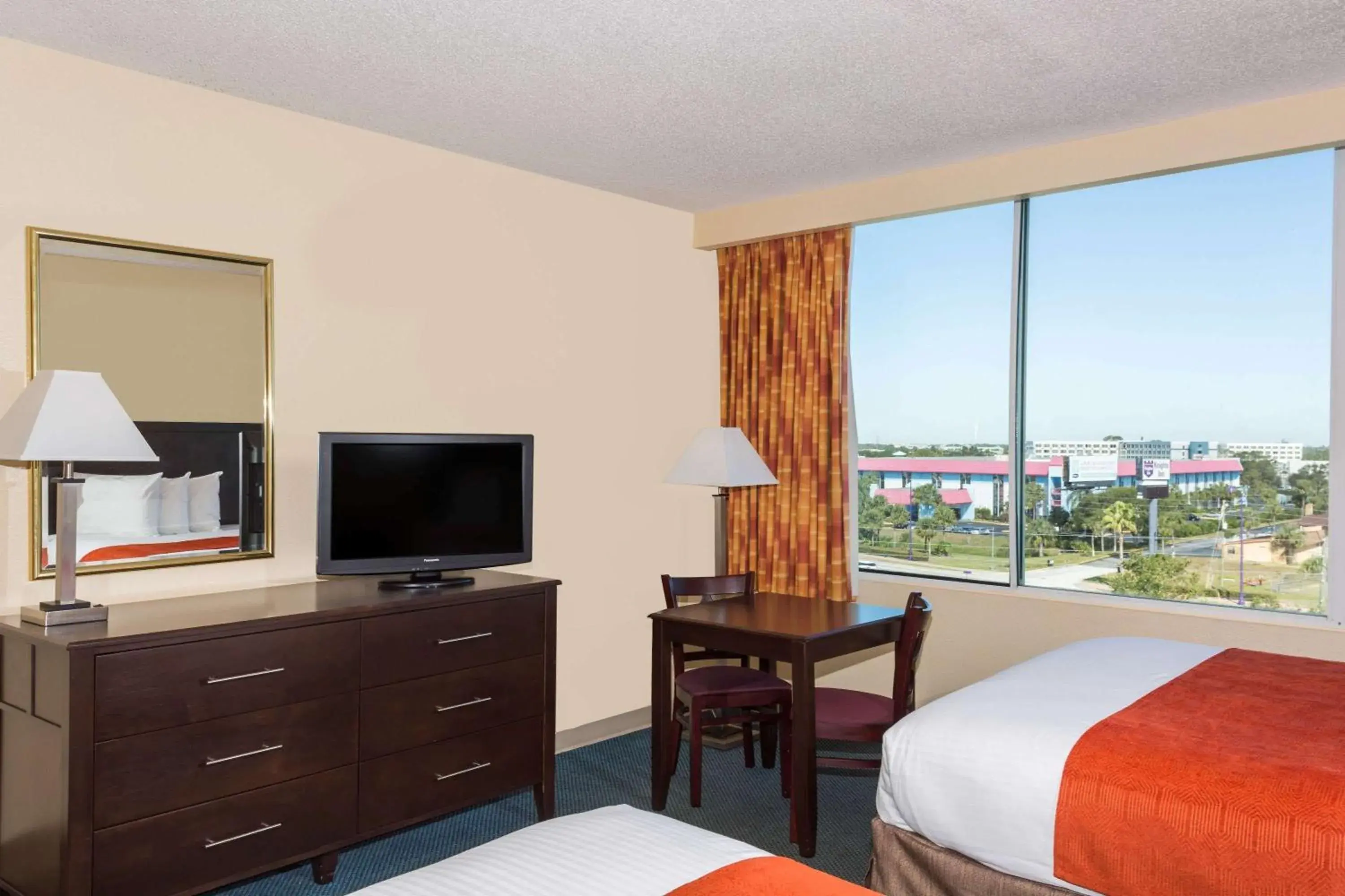 Photo of the whole room, Bed in Ramada by Wyndham Kissimmee Gateway - Free Theme Park Shuttle Photo of the whole room, Bed in Ramada by Wyndham Kissimmee Gateway - Free Theme Park Shuttle