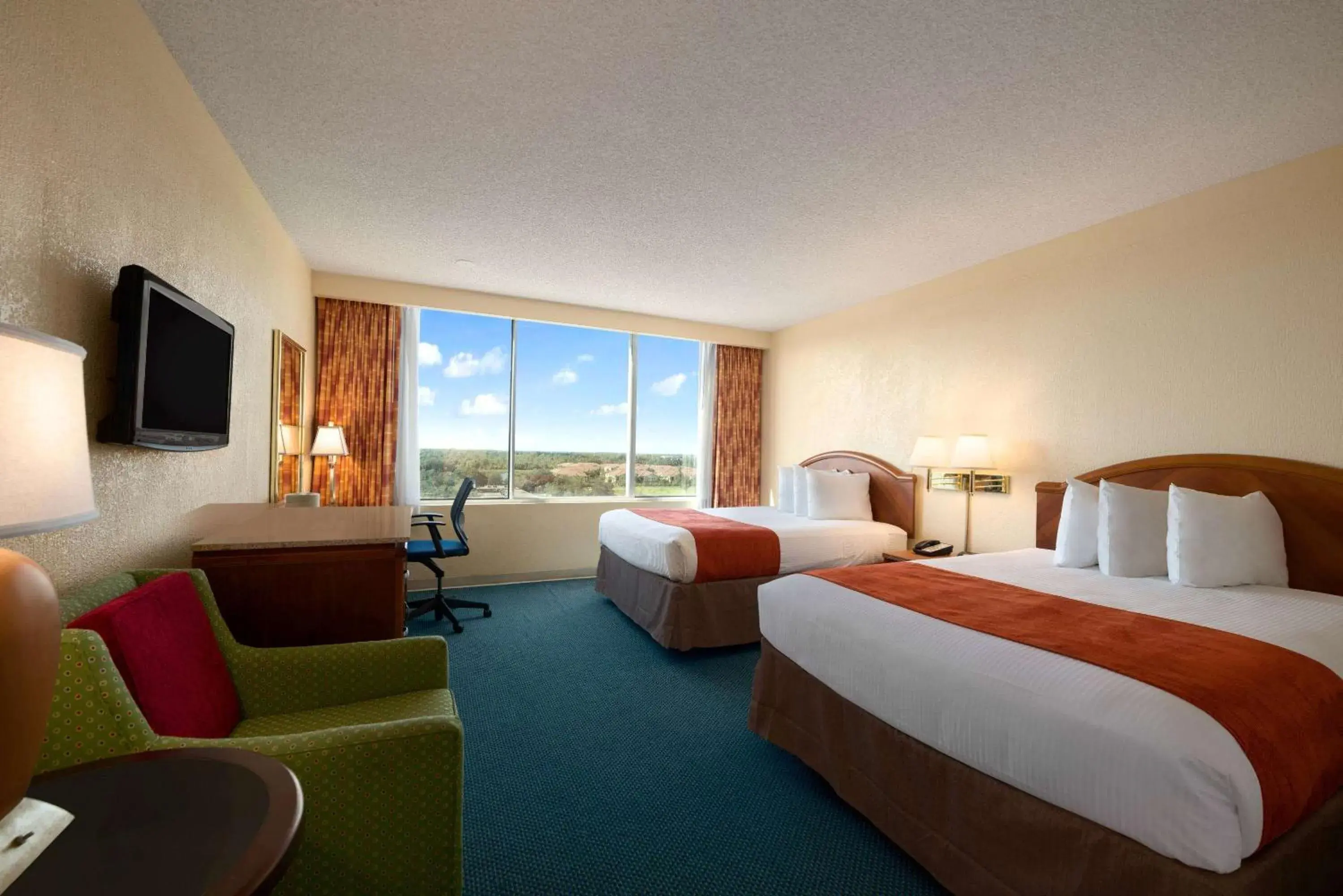 Photo of the whole room, Bed in Ramada by Wyndham Kissimmee Gateway - Free Theme Park Shuttle Photo of the whole room, Bed in Ramada by Wyndham Kissimmee Gateway - Free Theme Park Shuttle