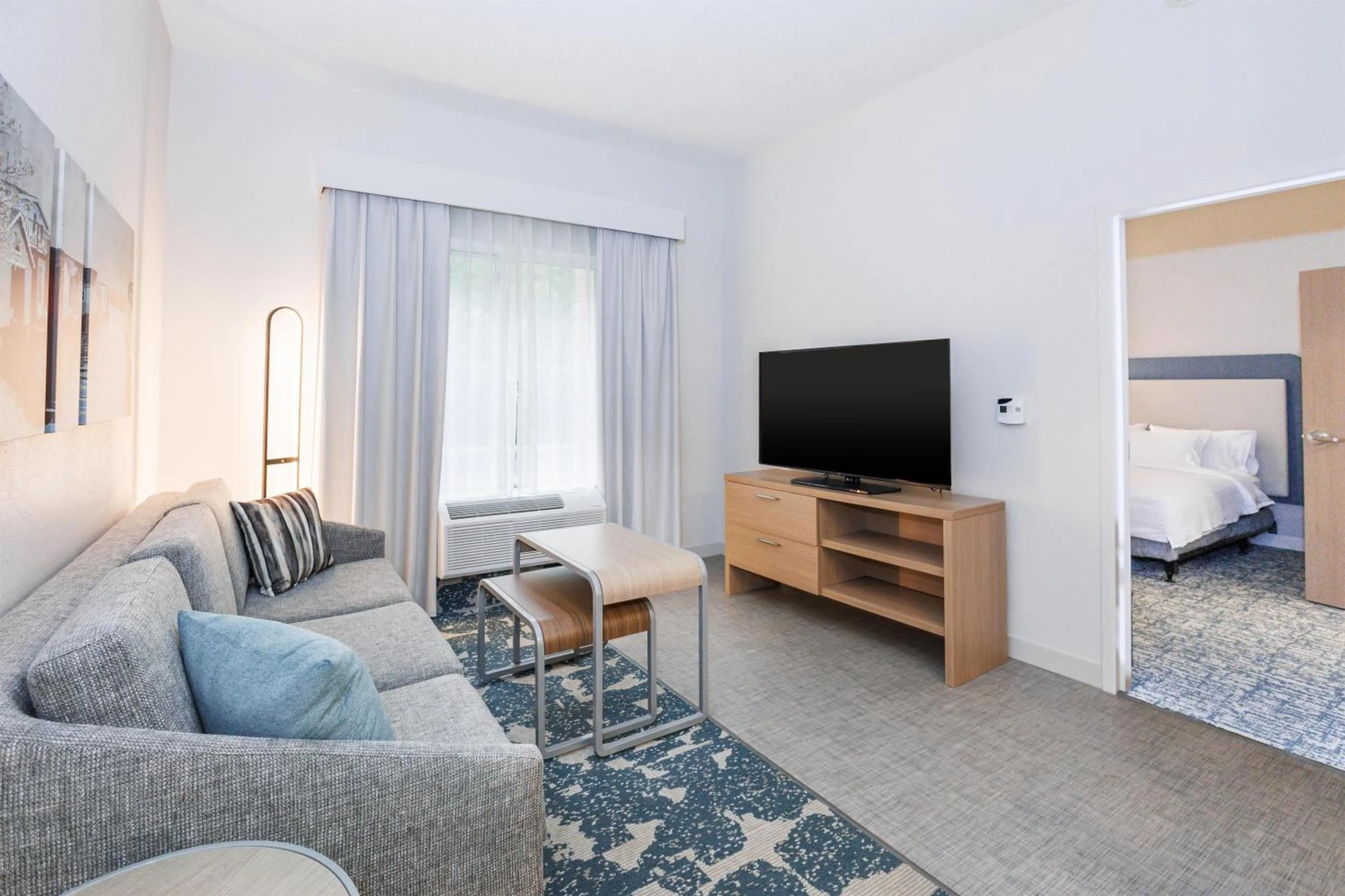 Living room, Bed in Homewood Suites by Hilton Rochester - Victor