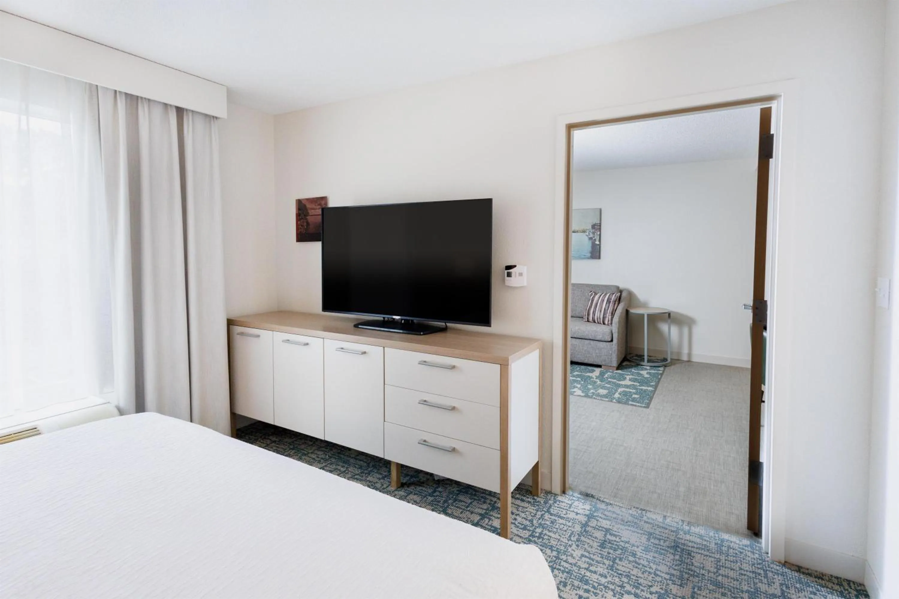 Living room, Bed in Homewood Suites by Hilton Rochester - Victor