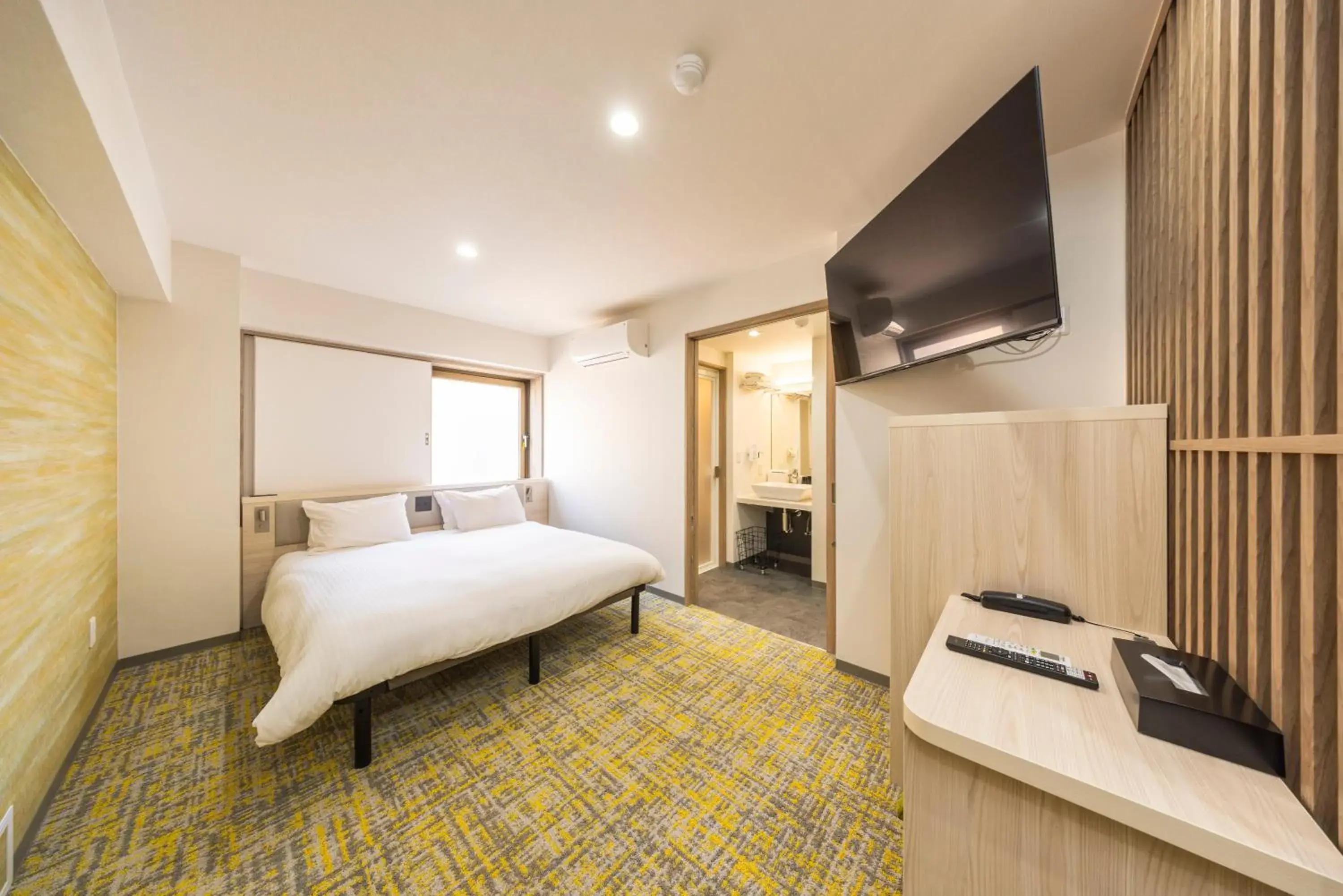 Bed in Hotel Cerezo Bed in Hotel Cerezo