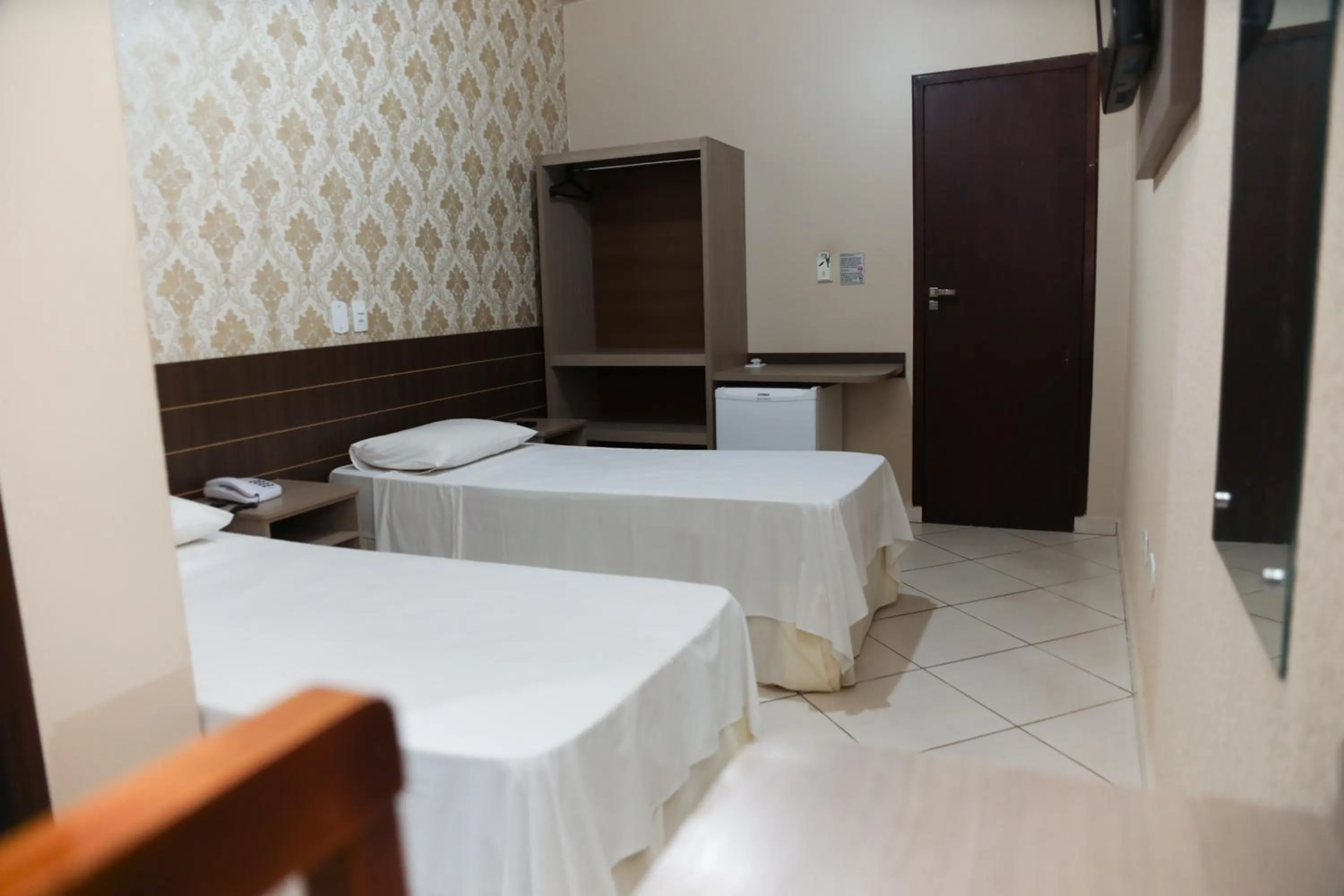 Bed in Hotel Villa Canoas