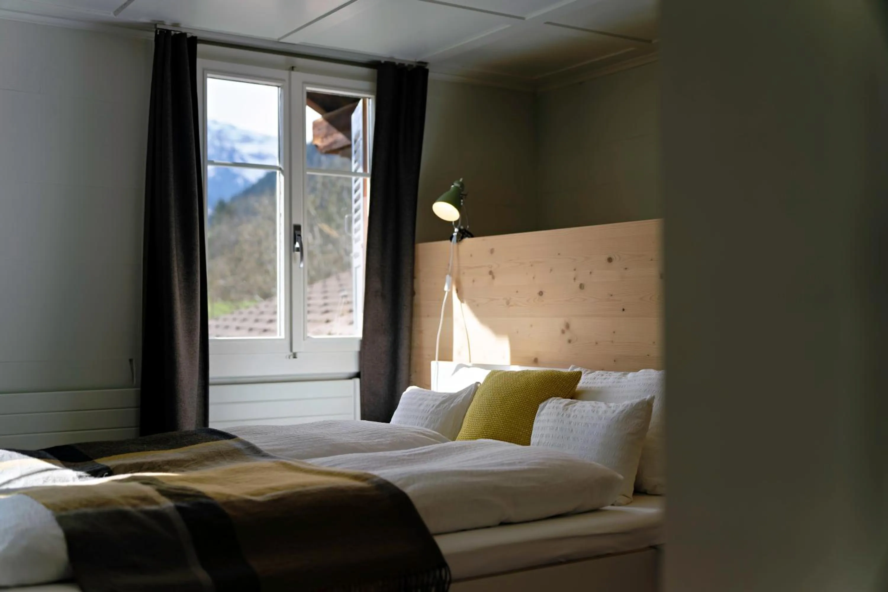 Bed in Lenk Lodge - Boutique & Design Hotel und Apartements