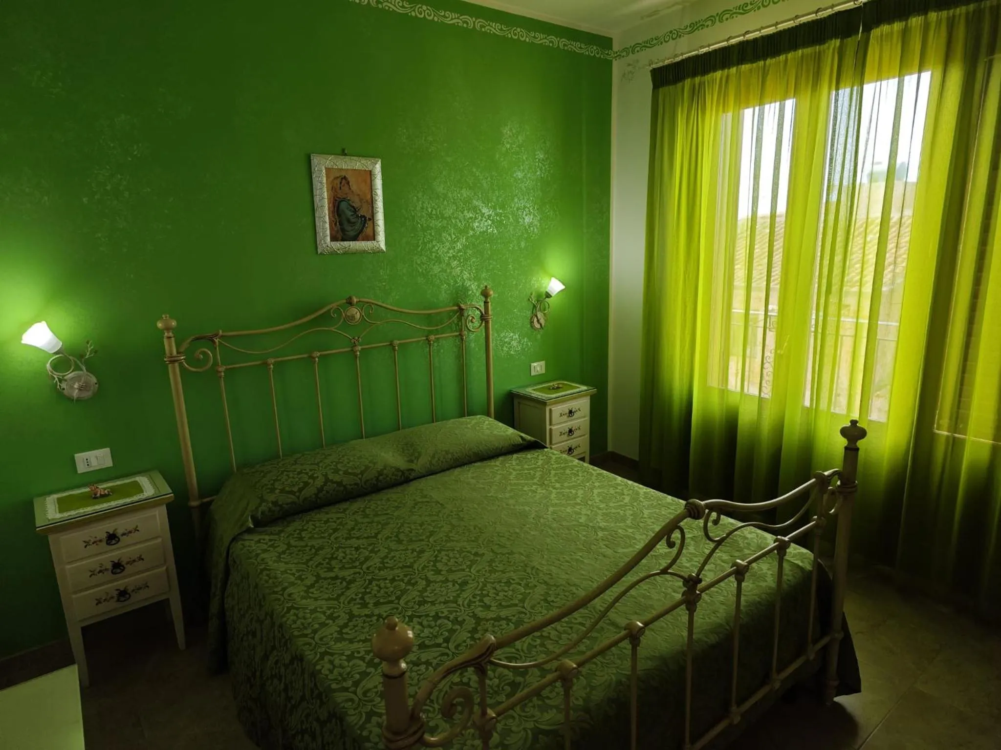 Bedroom in B&B Orchidea