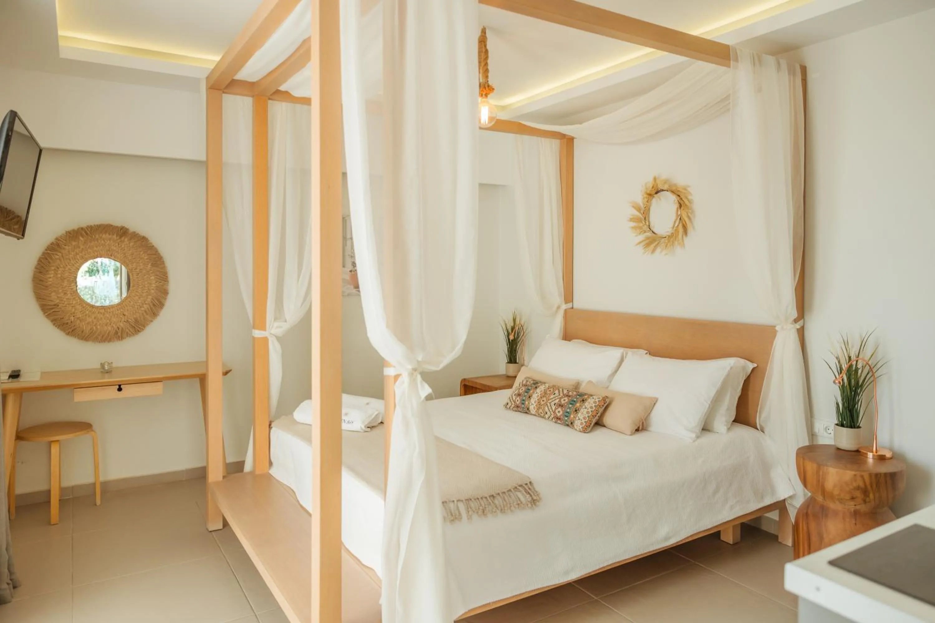 Bed in Golden Bay Suites & Maisonettes