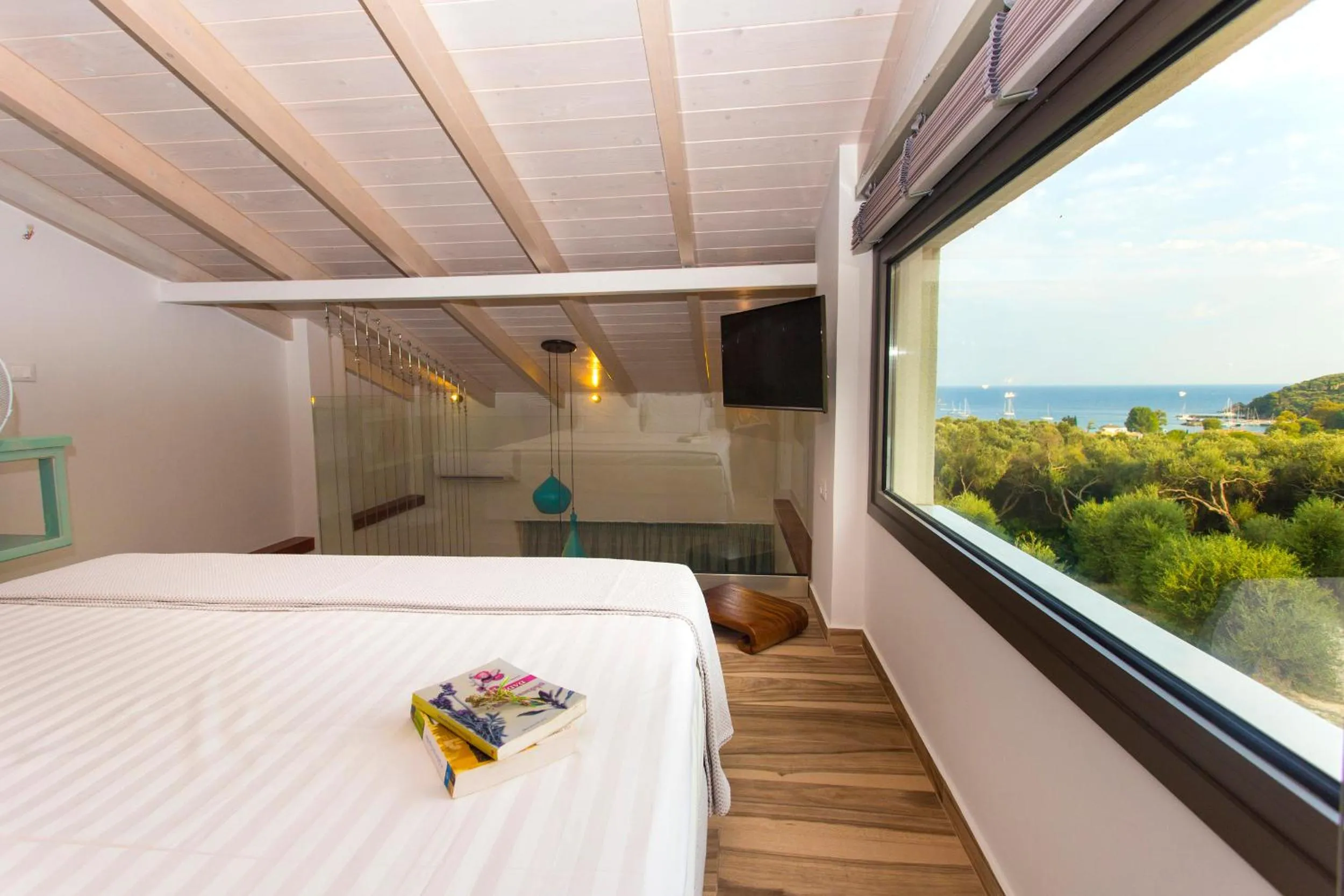 Bed in Golden Bay Suites & Maisonettes