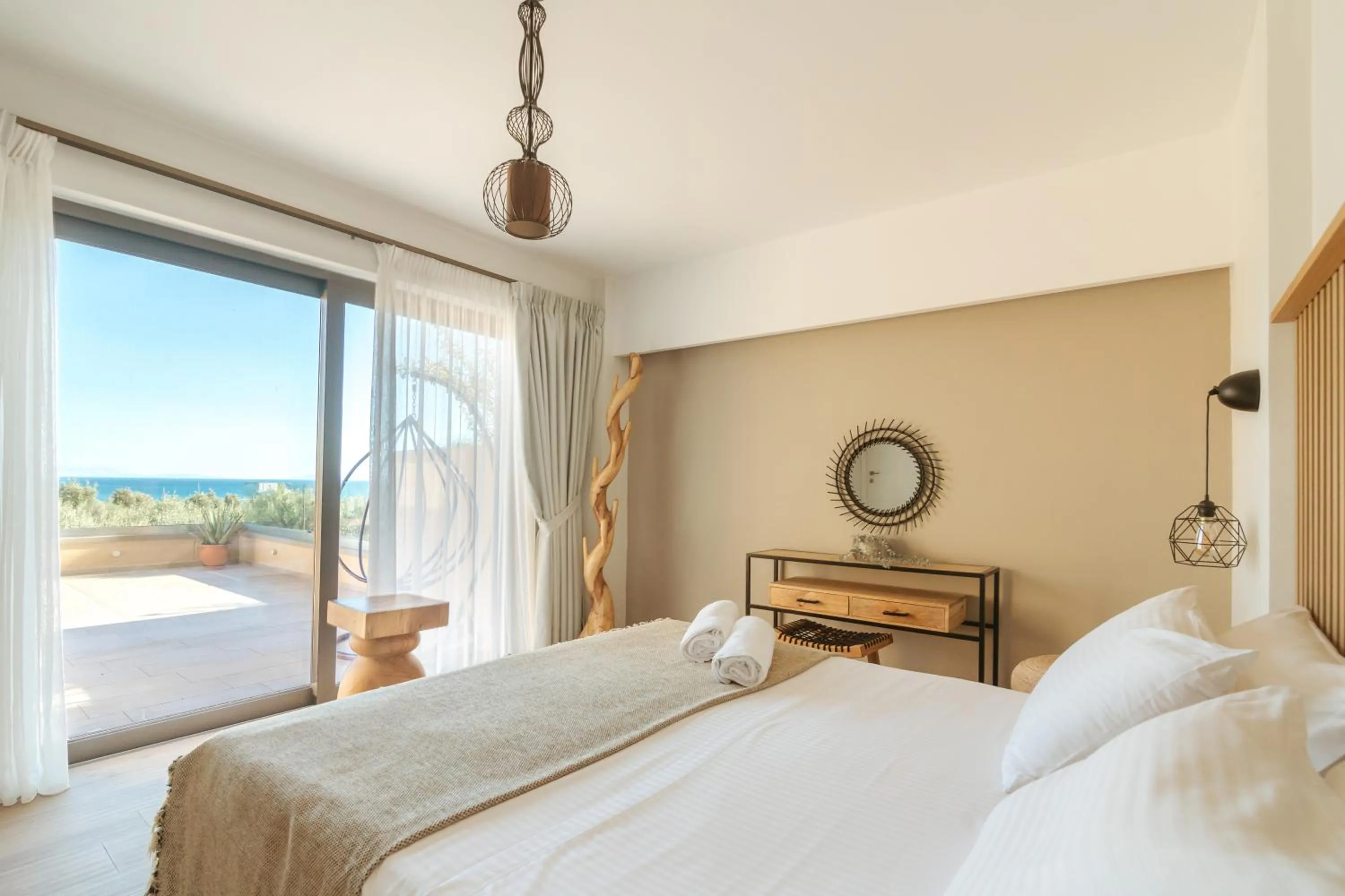 Bed in Golden Bay Suites & Maisonettes