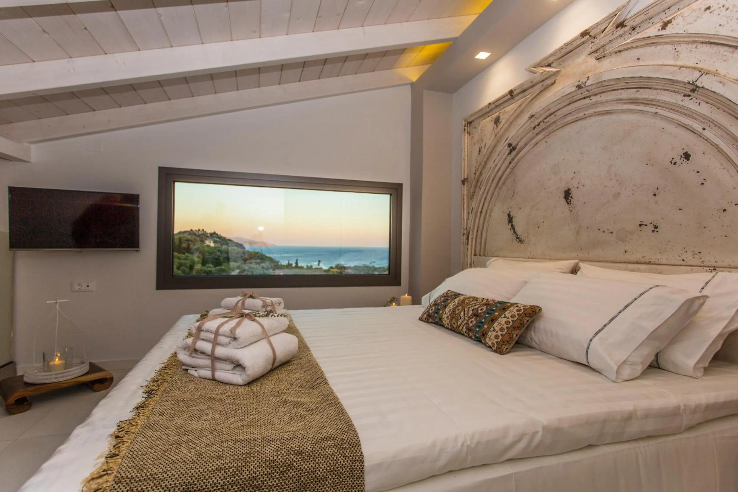 Bed in Golden Bay Suites & Maisonettes