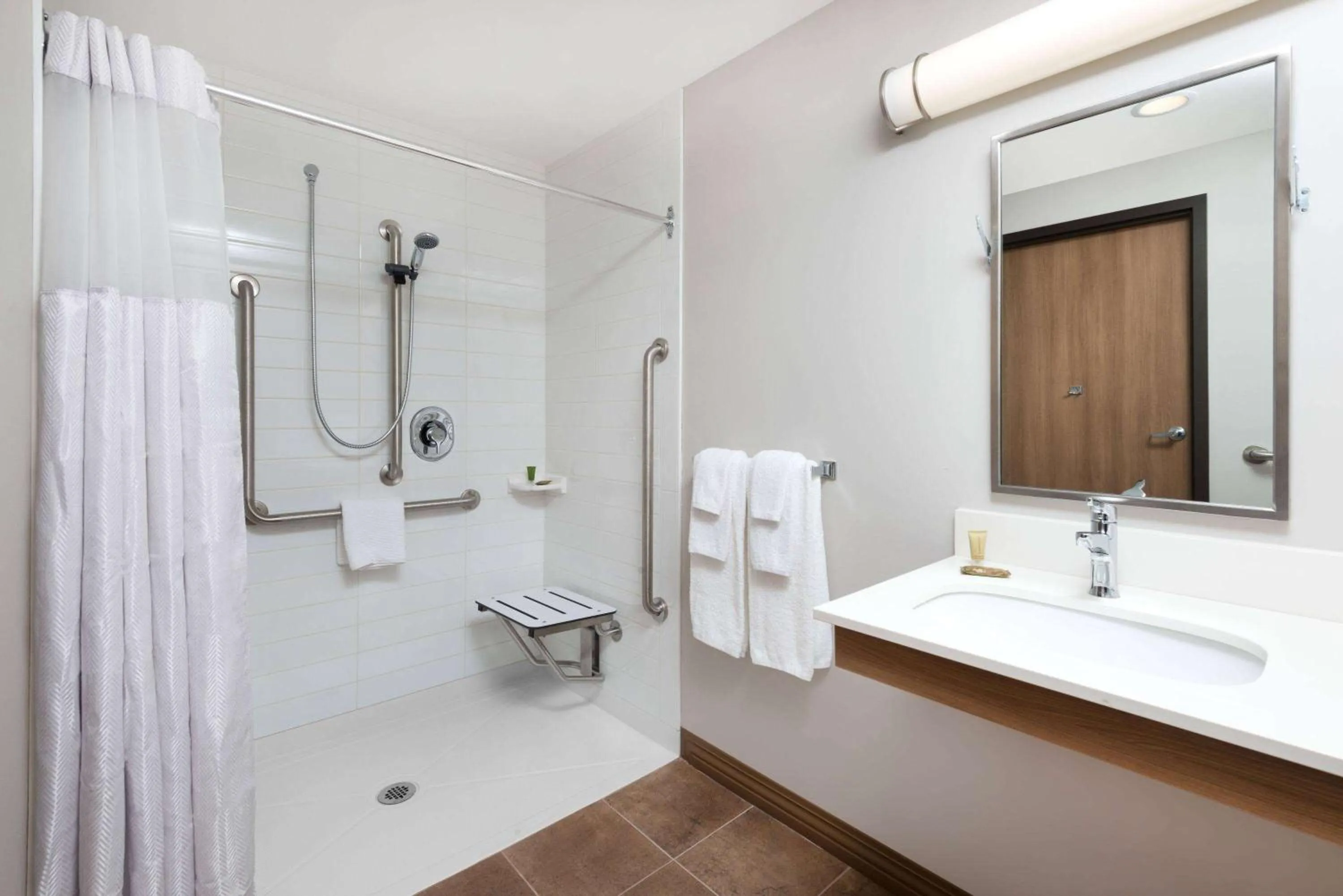 Shower in Microtel Inn & Suites by Wyndham Sudbury