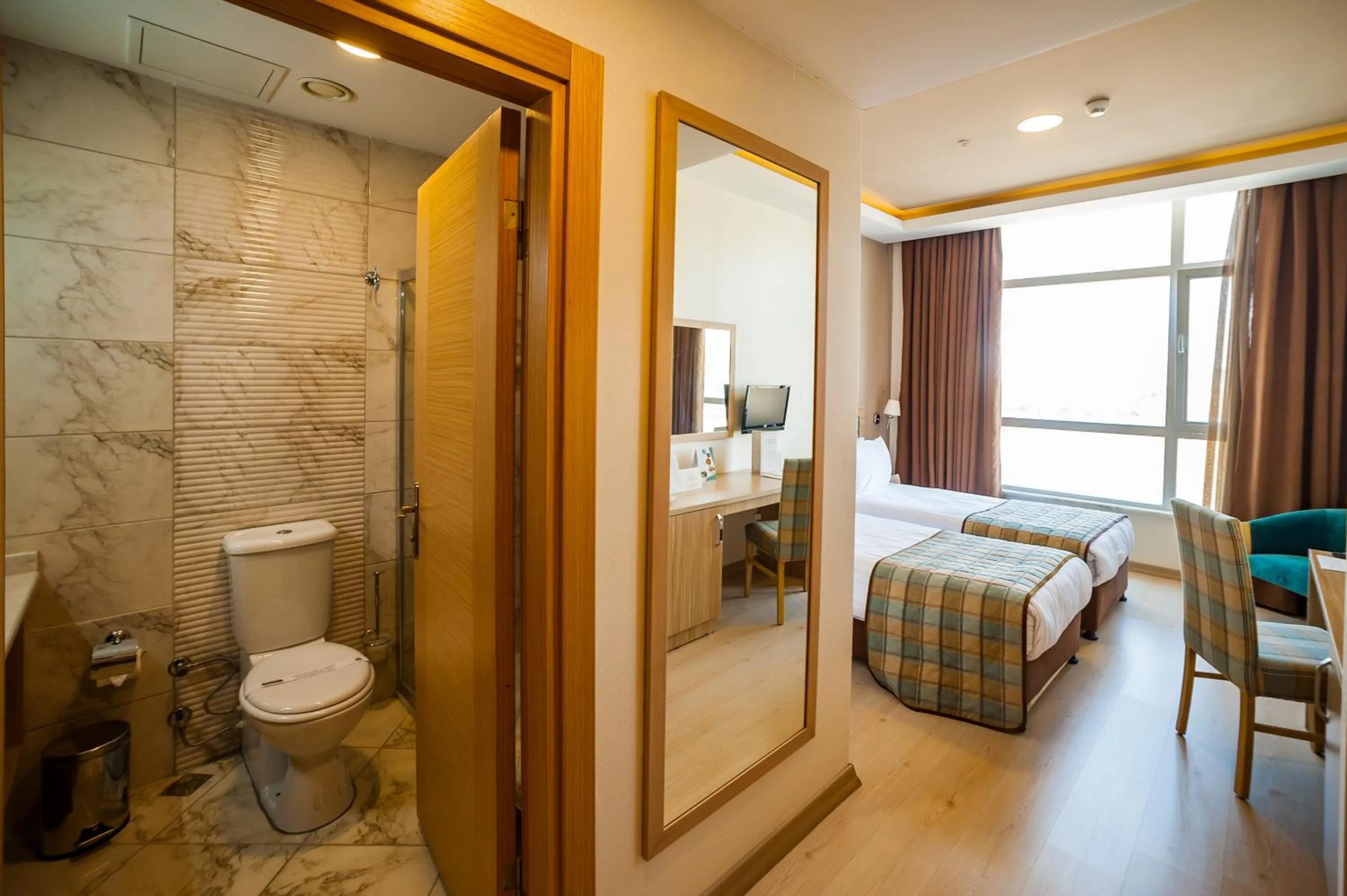 Bed, Bathroom in Akman TZOB Otel