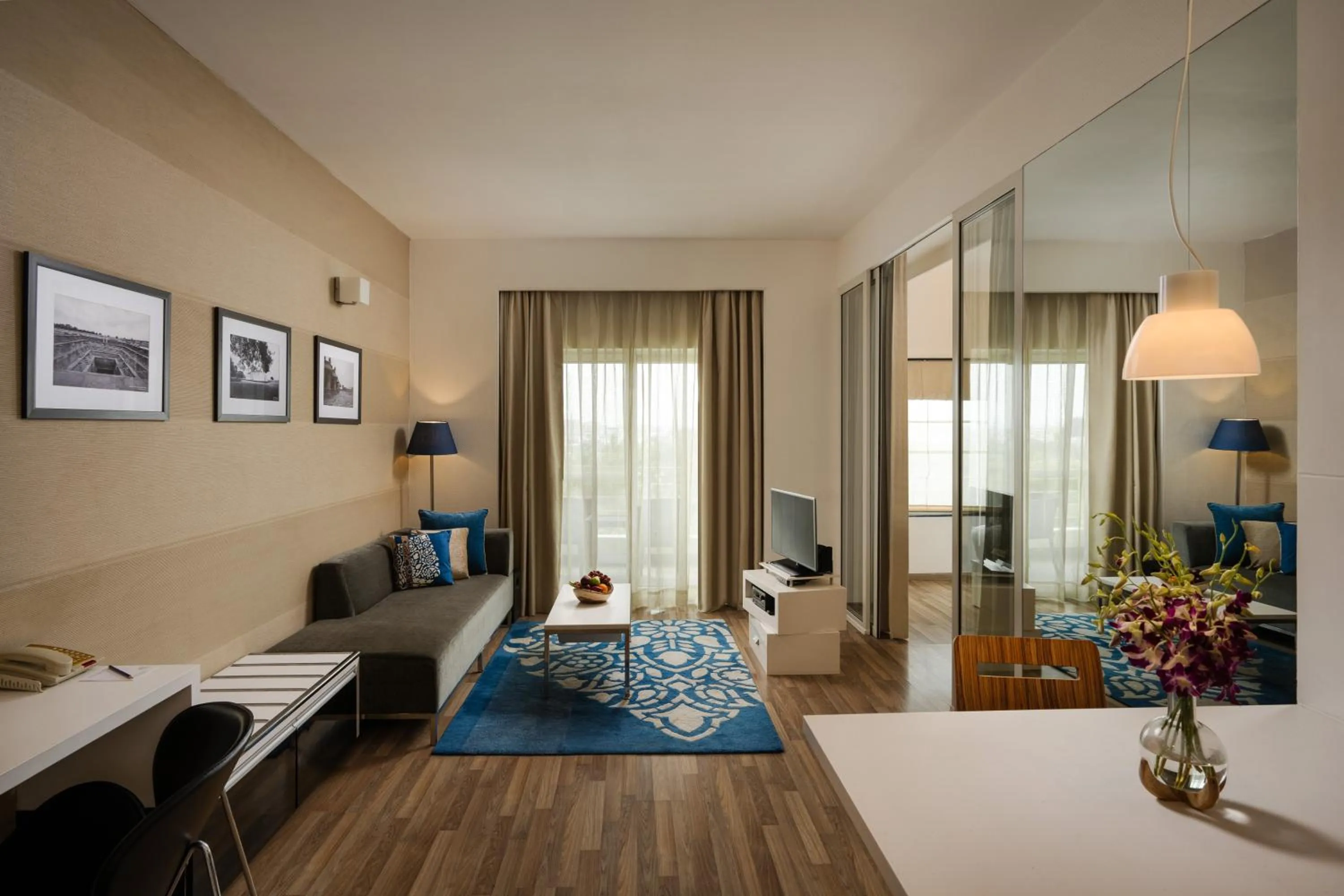 Living room, Bed in Grand Mercure Bangalore - An Accor Brand