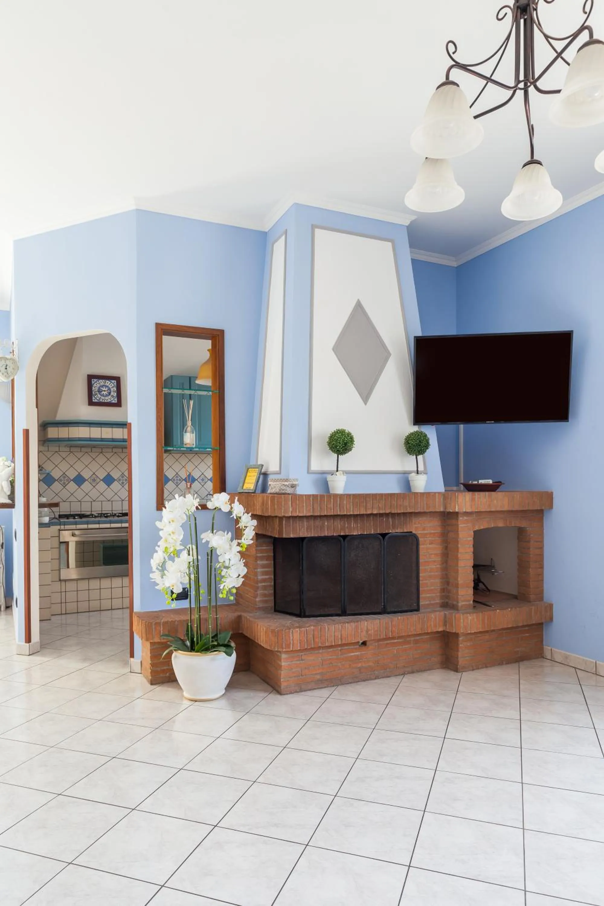 Communal lounge/ TV room in Casa Vacanze Giramondo