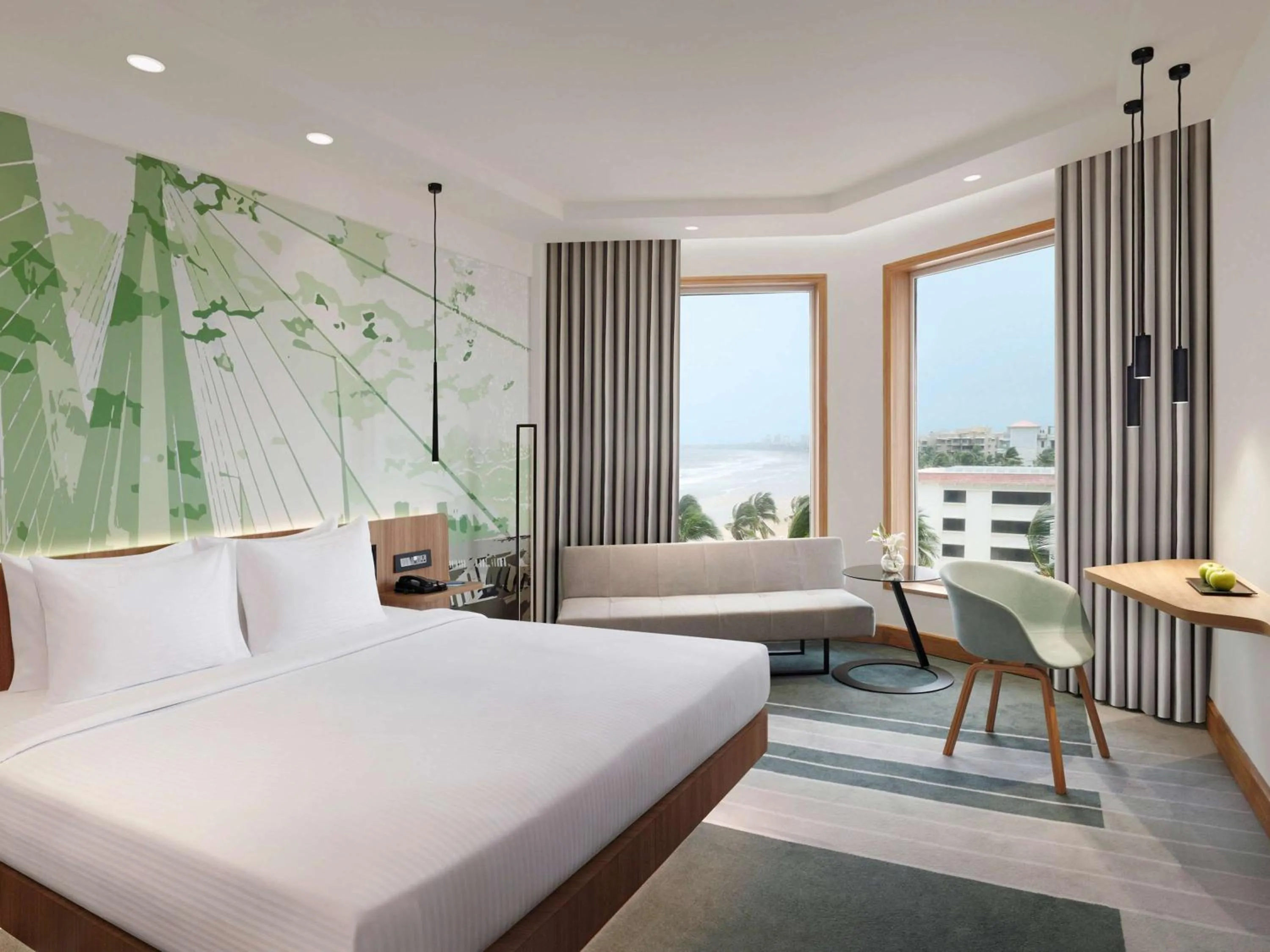 Property building, Bed in Novotel Mumbai Juhu Beach