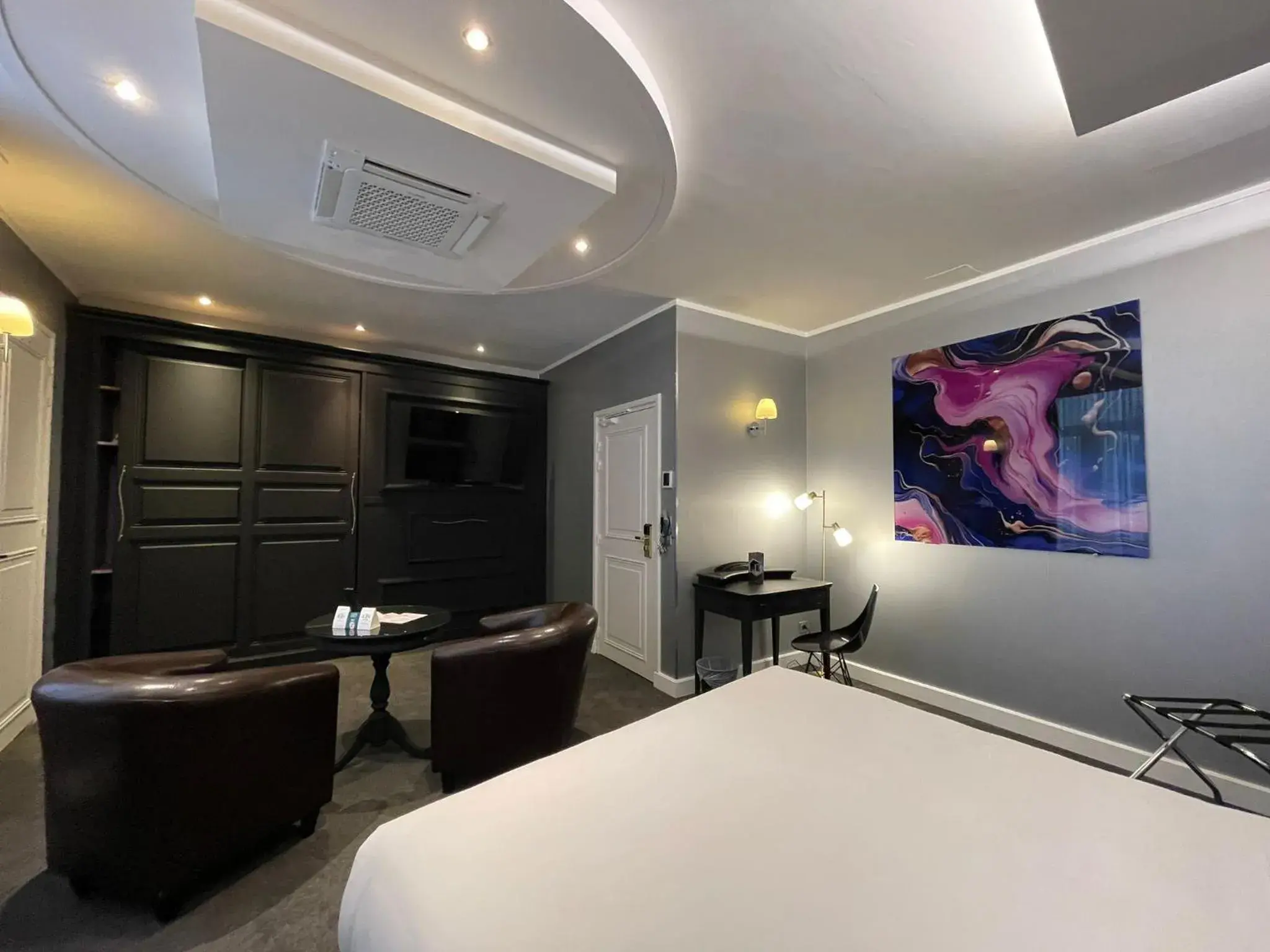 Photo of the whole room, Bed in LOGIS Hôtel Borel Photo of the whole room, Bed in LOGIS Hôtel Borel