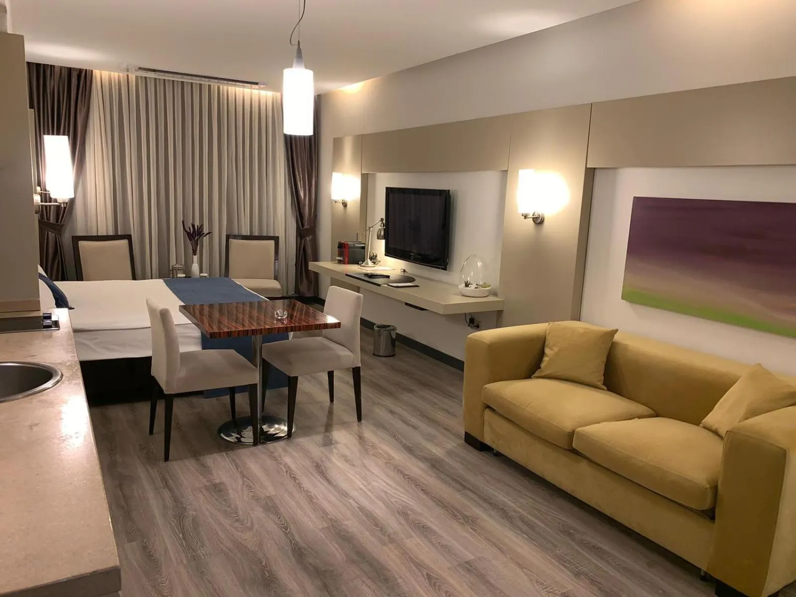 Communal lounge/ TV room in MY Hotel