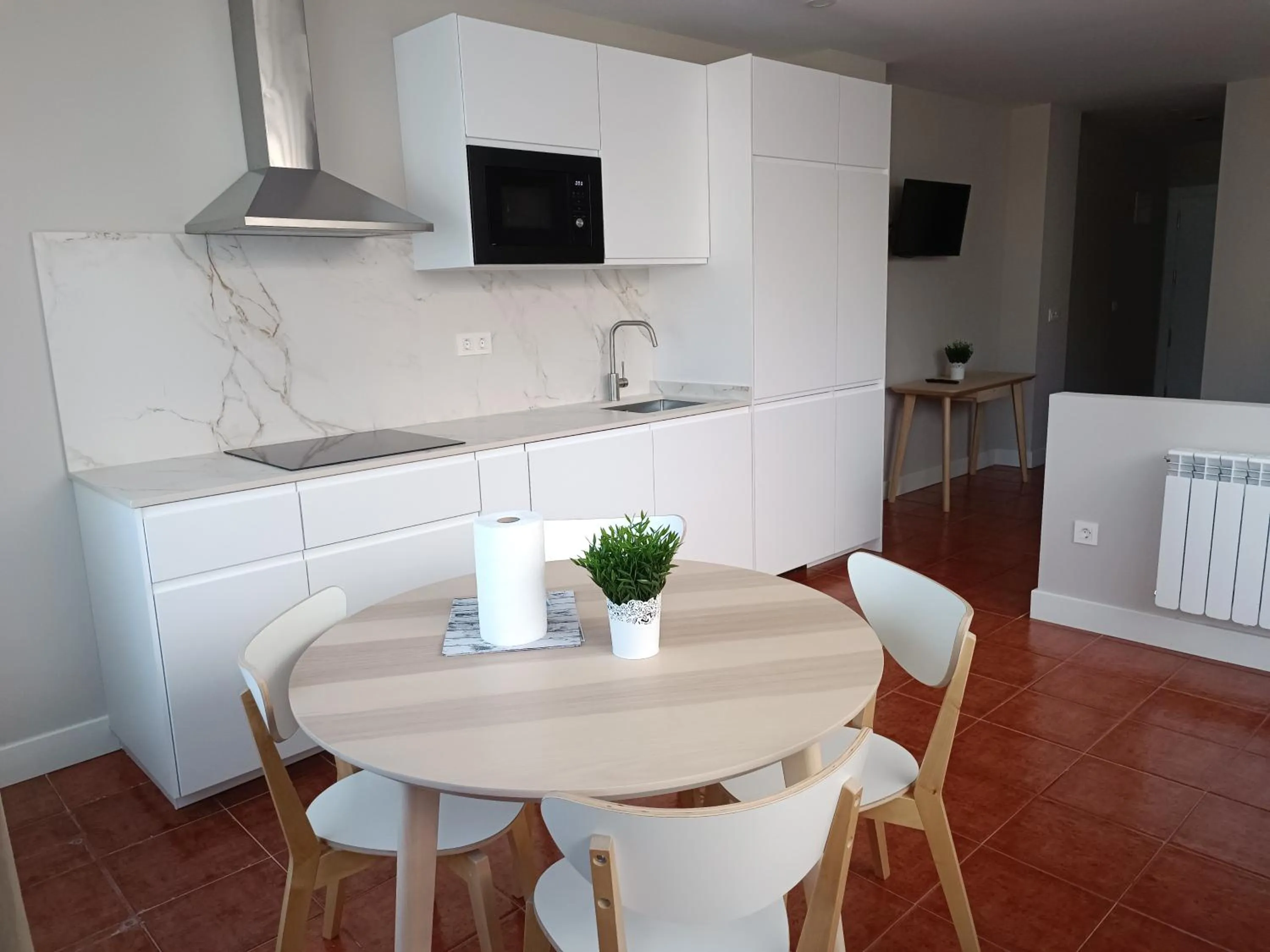 Dining area in Apartamentos Marina