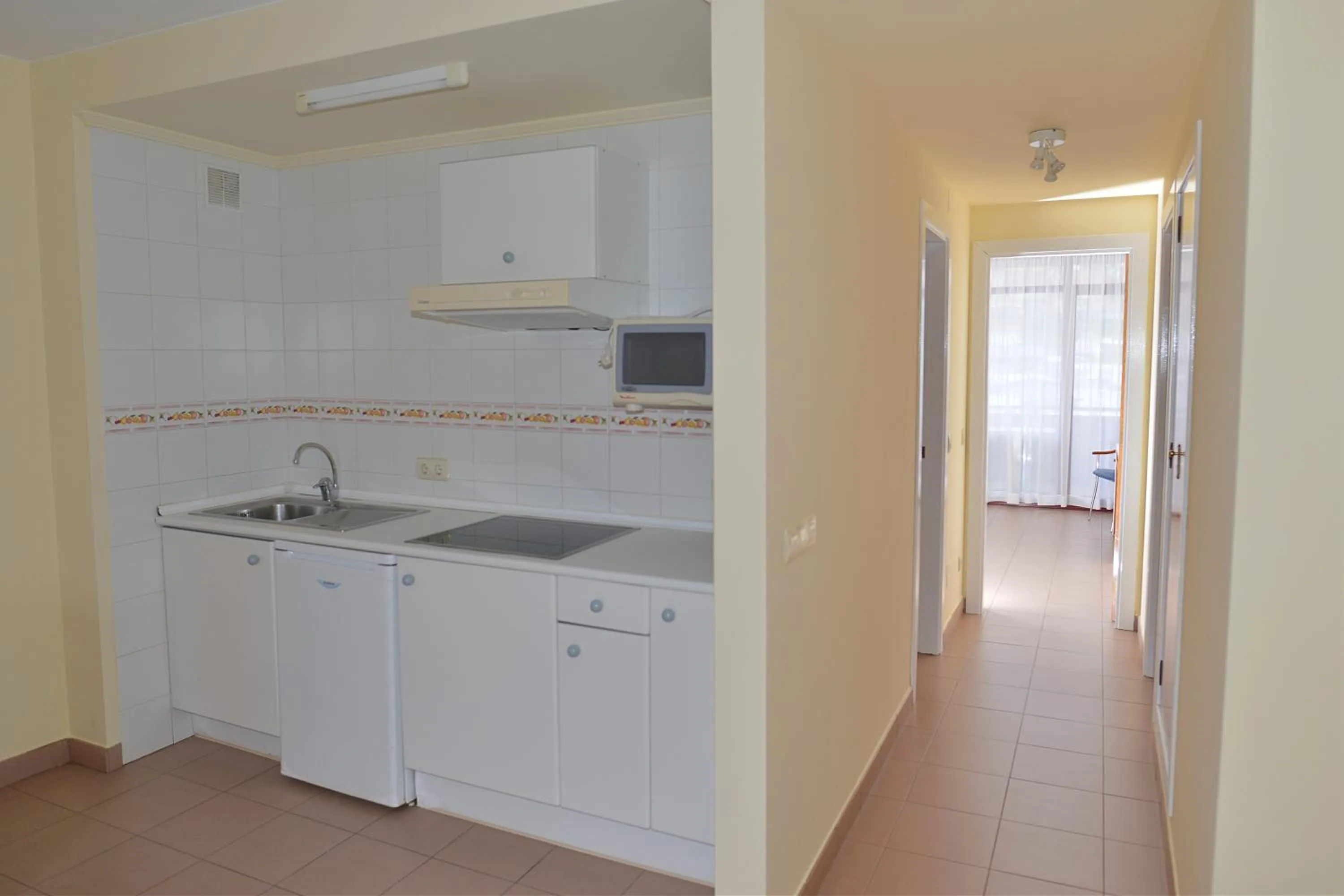 Kitchen or kitchenette in Apartamentos Marina