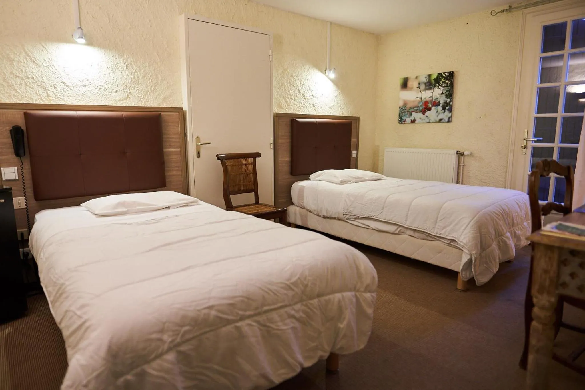 Bed in Hôtel La Flambée